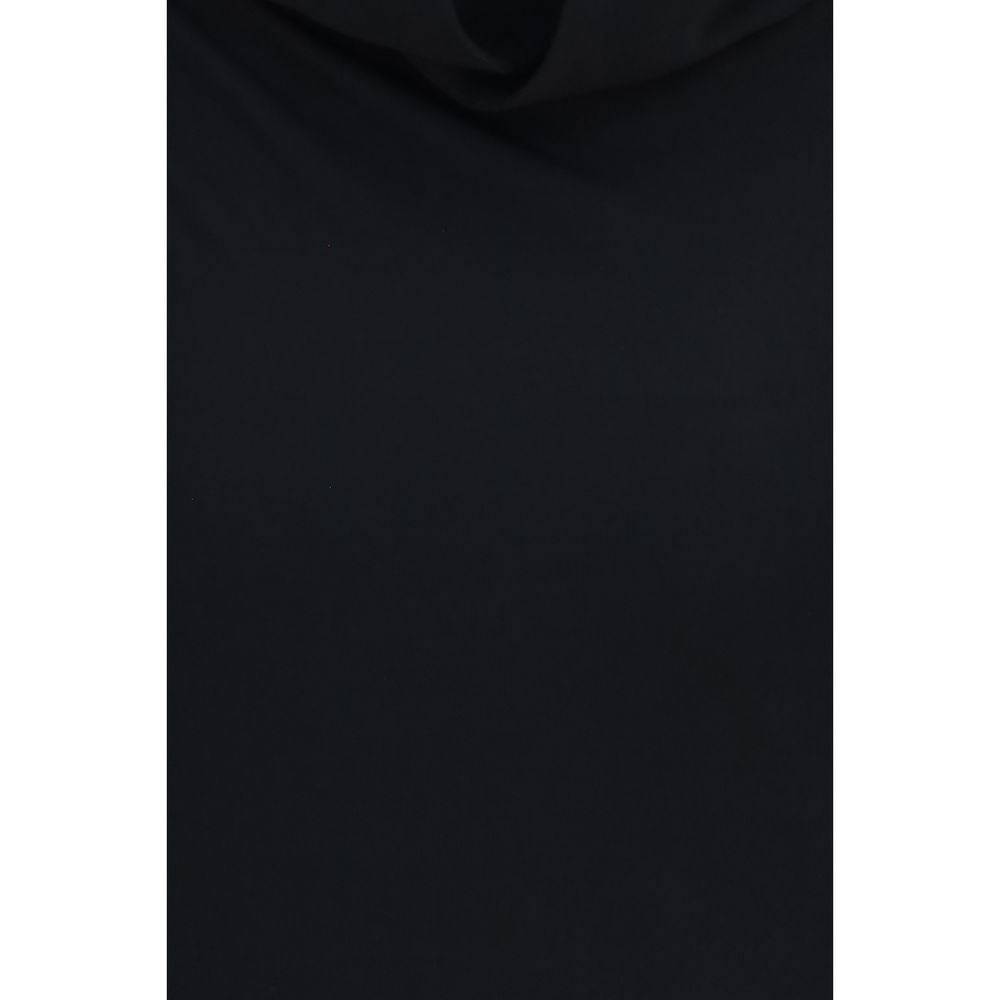 Indulge in the Tom Ford Black Viscose Cocktail Dress, a masterpiece of 100% viscose that embodies sophistication and sensuality, perfect for unforgettable evenings.