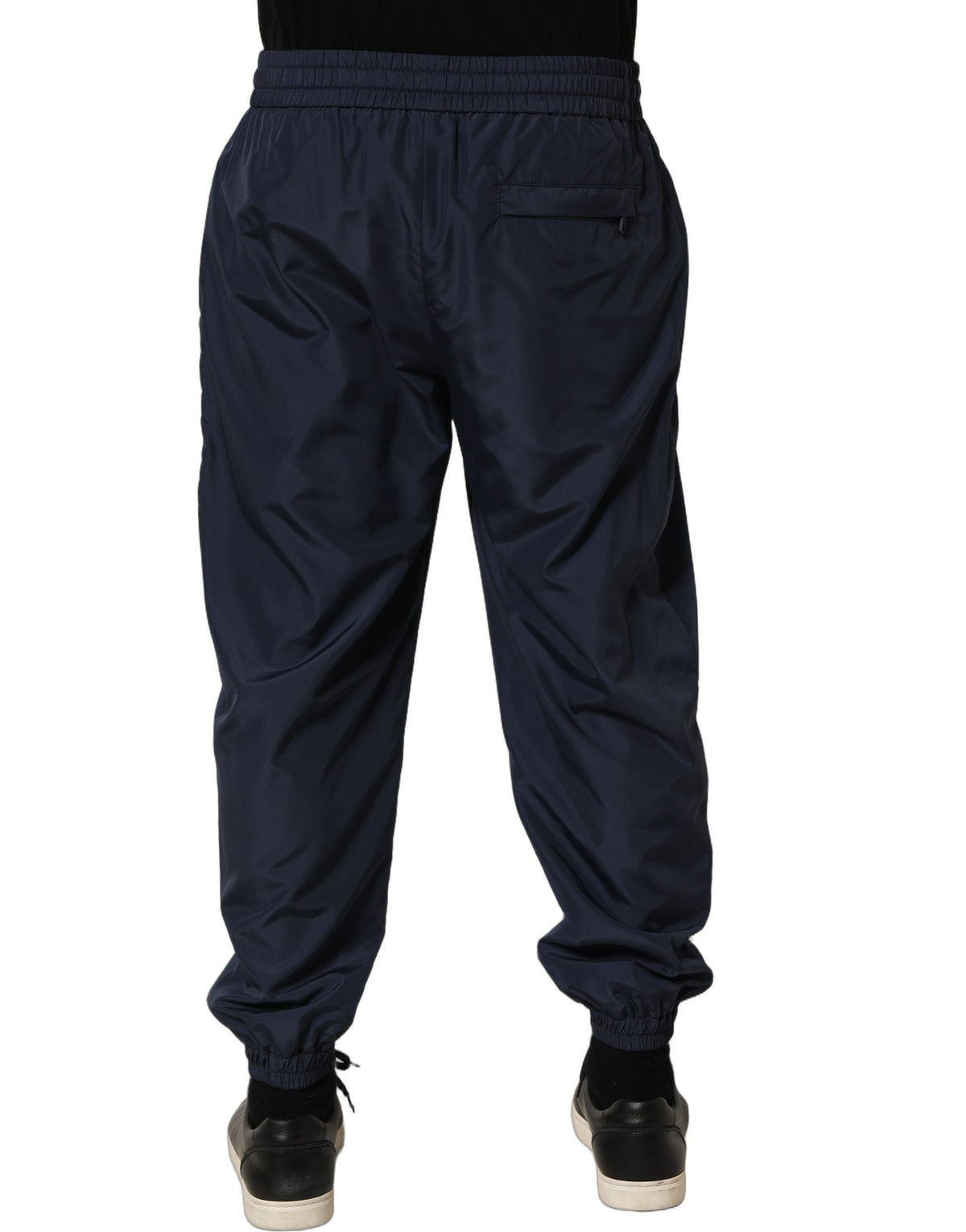 Indulge in the exquisite Dolce & Gabbana Dark Blue Jogger Sweatpants, where luxurious craftsmanship meets modern elegance, perfect for those who embody sophistication and style.