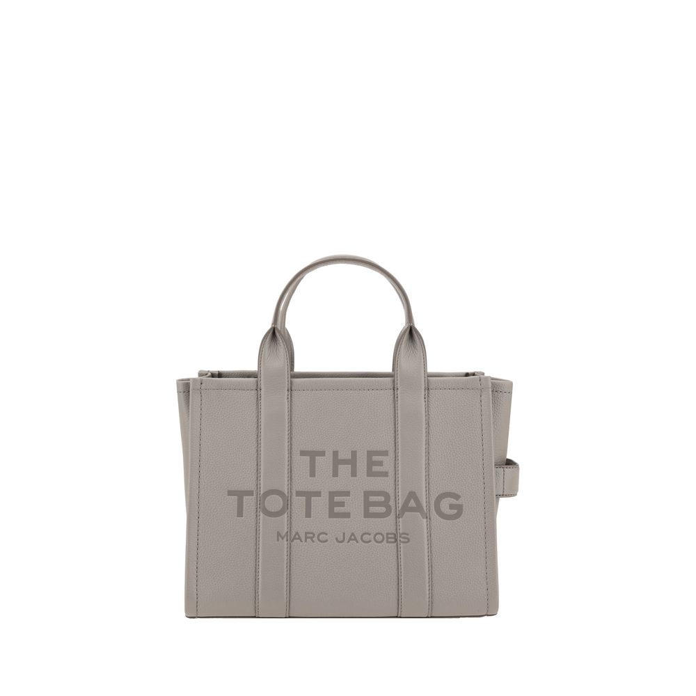Indulge in the exquisite Marc Jacobs Gray Calf Leather Bos Taurus Handbag, a masterpiece of grained leather artistry, embodying luxury and sophistication for the discerning individual.