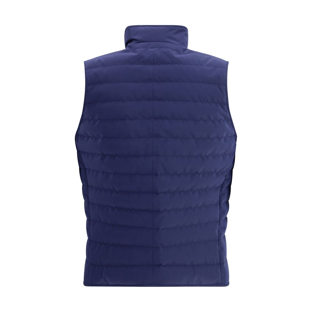 Discover the Brunello Cucinelli Blue Polyester Sleeveless Jacket, a masterpiece of refined craftsmanship and luxurious style, perfect for elevating any sophisticated wardrobe.