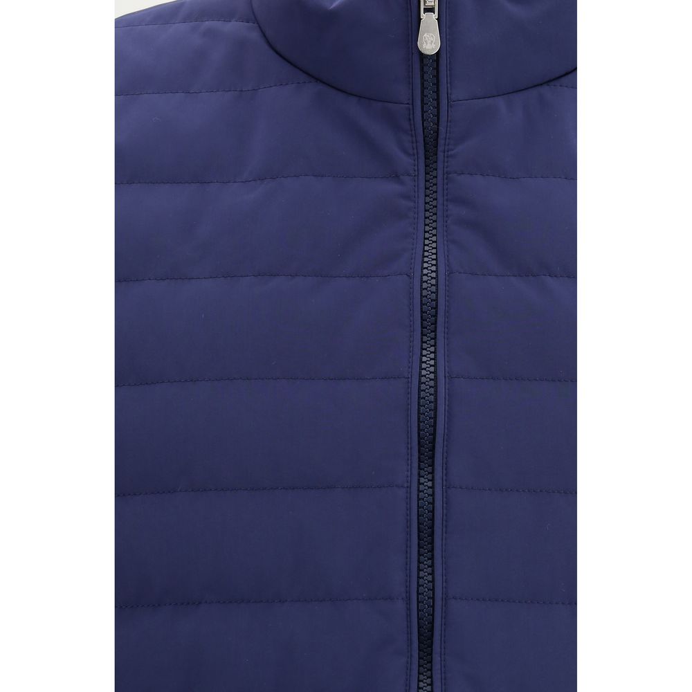 Elevate your wardrobe with the Brunello Cucinelli Blue Polyester Sleeveless Jacket, a masterpiece of refined craftsmanship and luxurious comfort, perfect for any occasion.