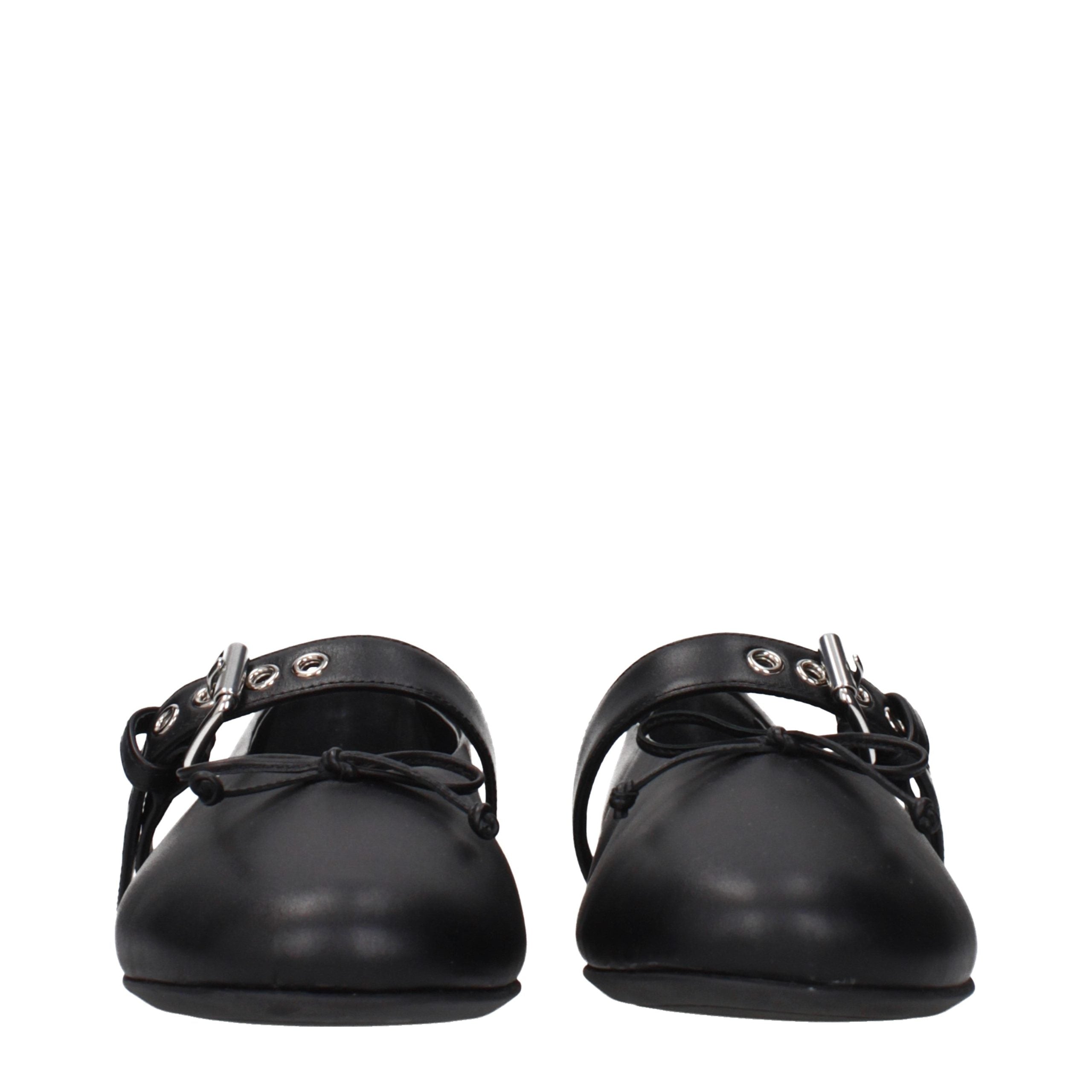 Indulge in the sophistication of Miu Miu Black Leather Ballet Flats, where exquisite craftsmanship meets timeless elegance, perfect for the discerning individual.