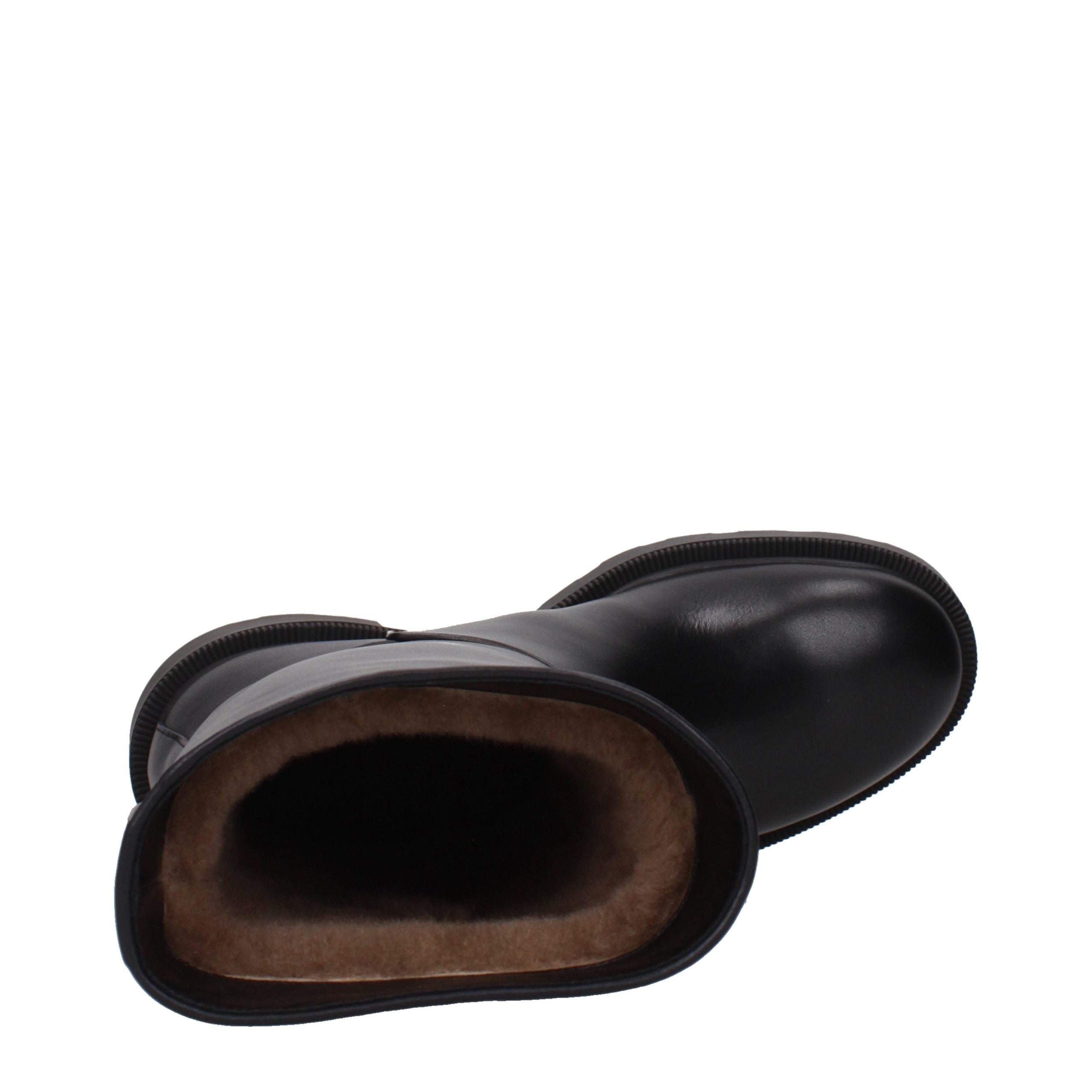 Step into the allure of The Row Black Leather Boots, where artisanal craftsmanship meets timeless elegance, elevating your style with luxurious sophistication.