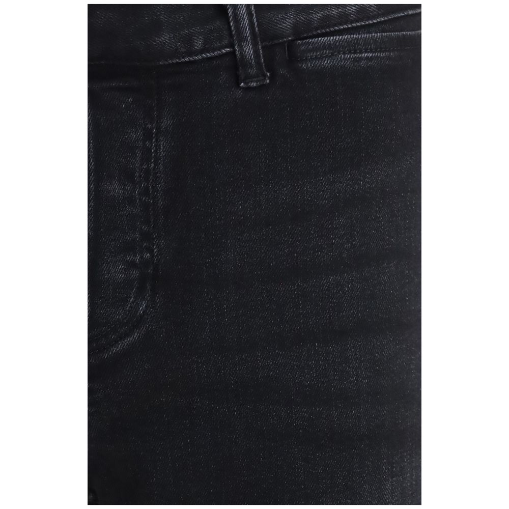 Experience the allure of Gucci Black Cotton Flared Jeans, crafted from premium stretch denim, embodying timeless elegance and modern sophistication for the discerning individual.