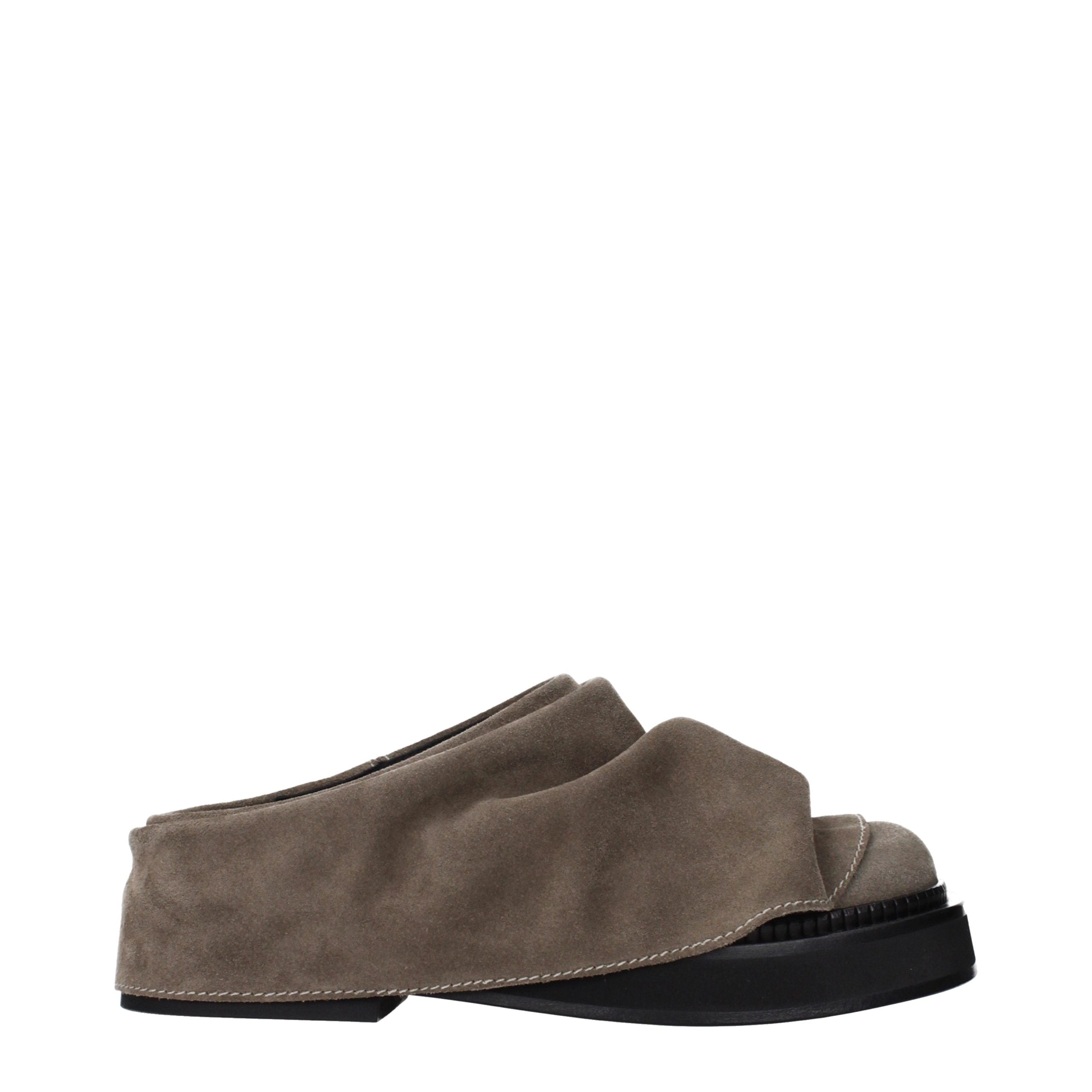 Step into a world of exquisite elegance with The Attico Gray Leather Slippers, where vintage charm meets unparalleled craftsmanship, perfect for the discerning individual.