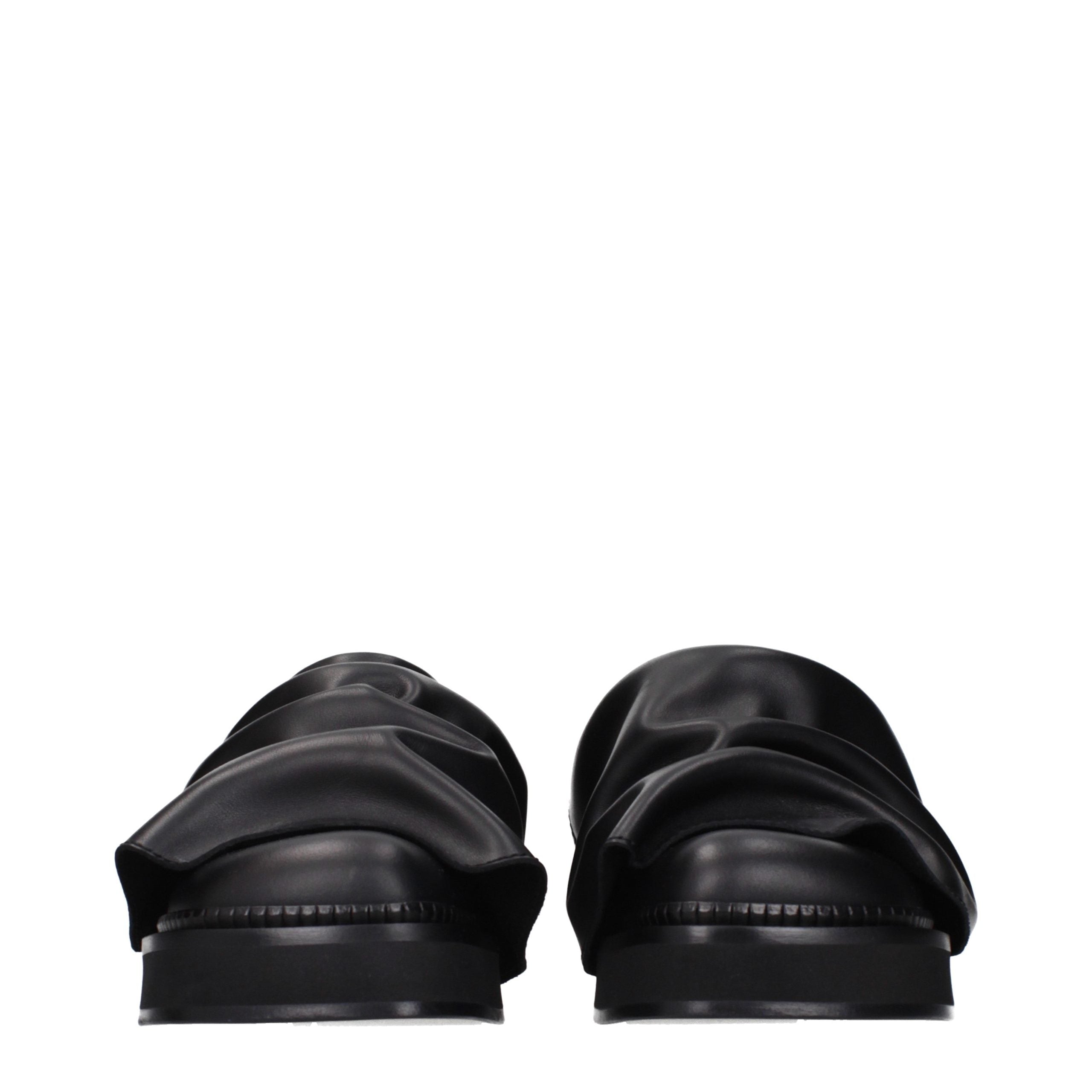 Step into a realm of elegance with The Attico Black Leather Slippers, where exquisite craftsmanship meets timeless luxury, perfect for the discerning connoisseur.