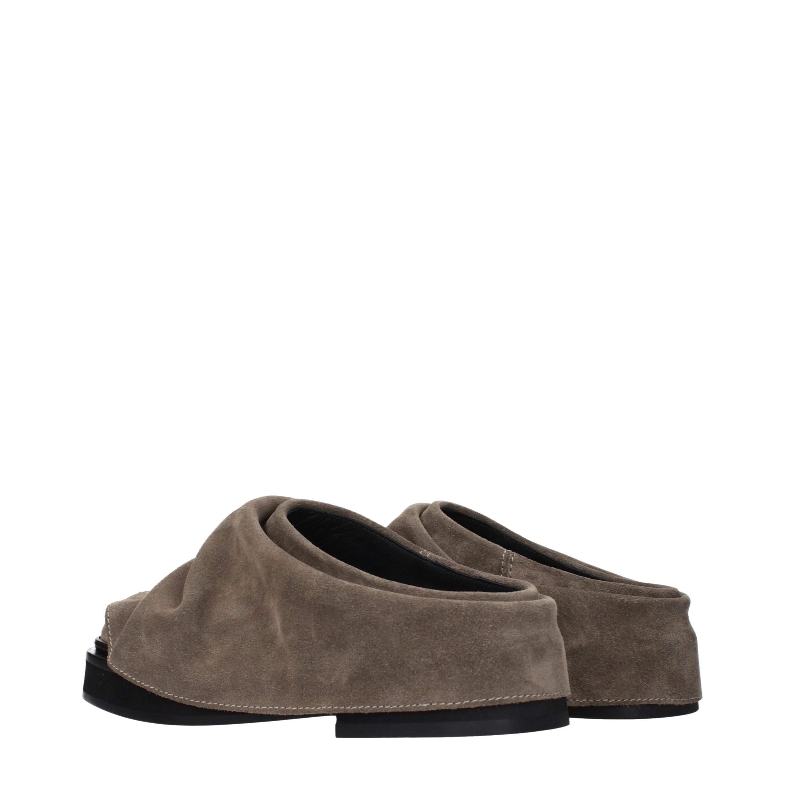 Step into timeless elegance with The Attico Gray Leather Slippers, where exquisite craftsmanship meets vintage allure, perfect for the discerning individual who appreciates luxury.