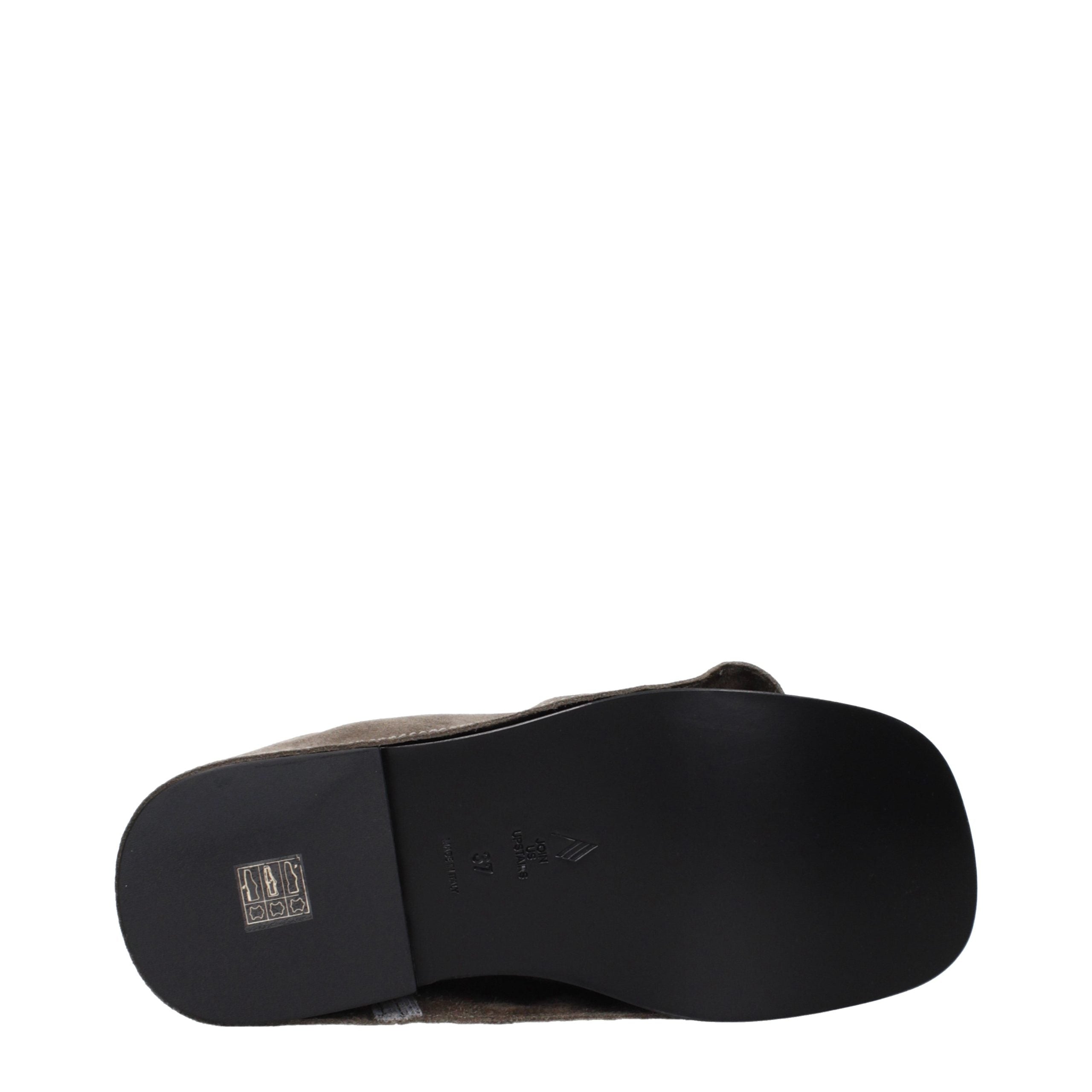 Step into a world of exquisite elegance with The Attico Gray Leather Slippers, where vintage allure meets unparalleled craftsmanship for the discerning connoisseur.