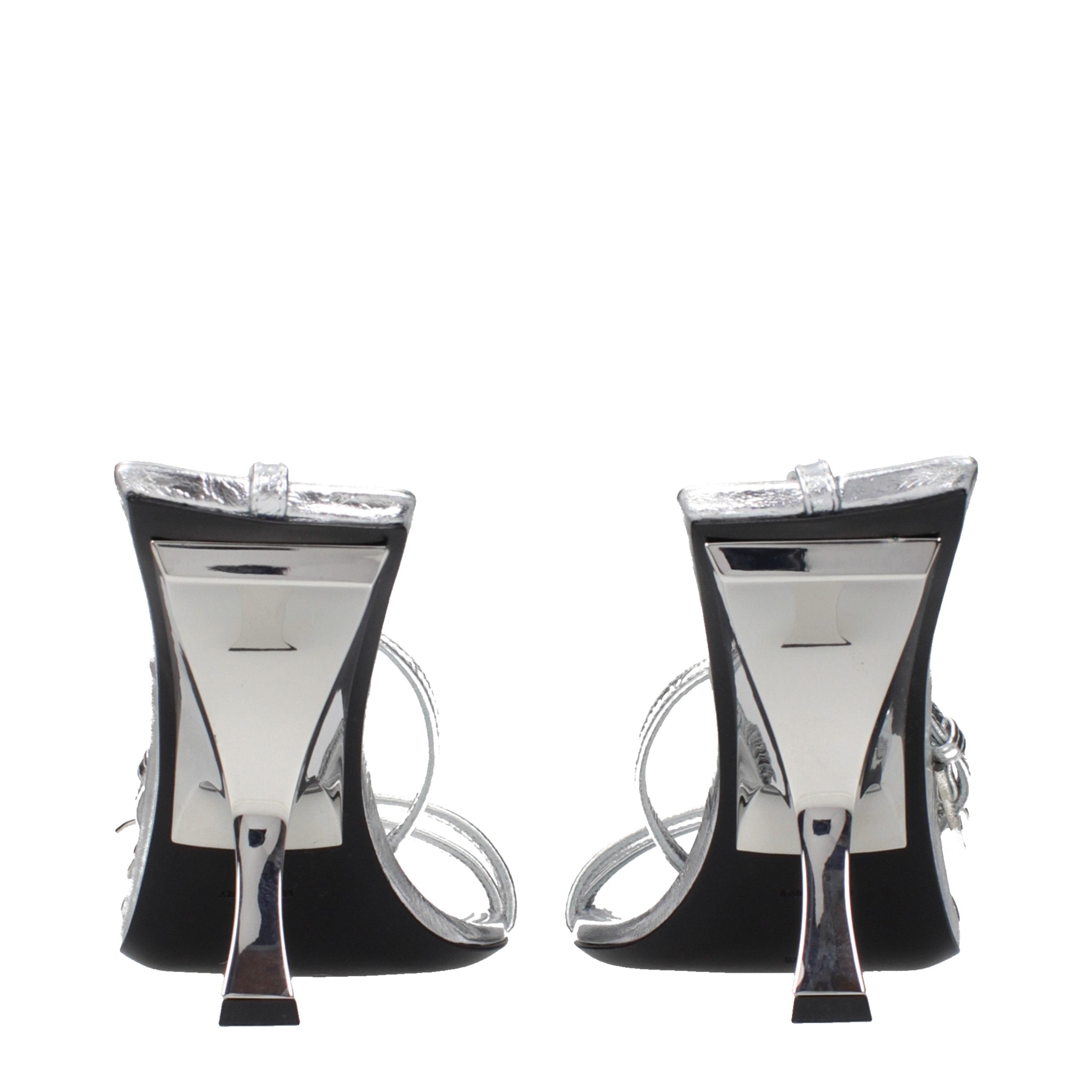 Step into a world of sophistication with The Attico Gray Leather Stiletto Heel Sandals, where exquisite craftsmanship meets timeless elegance for the discerning individual.