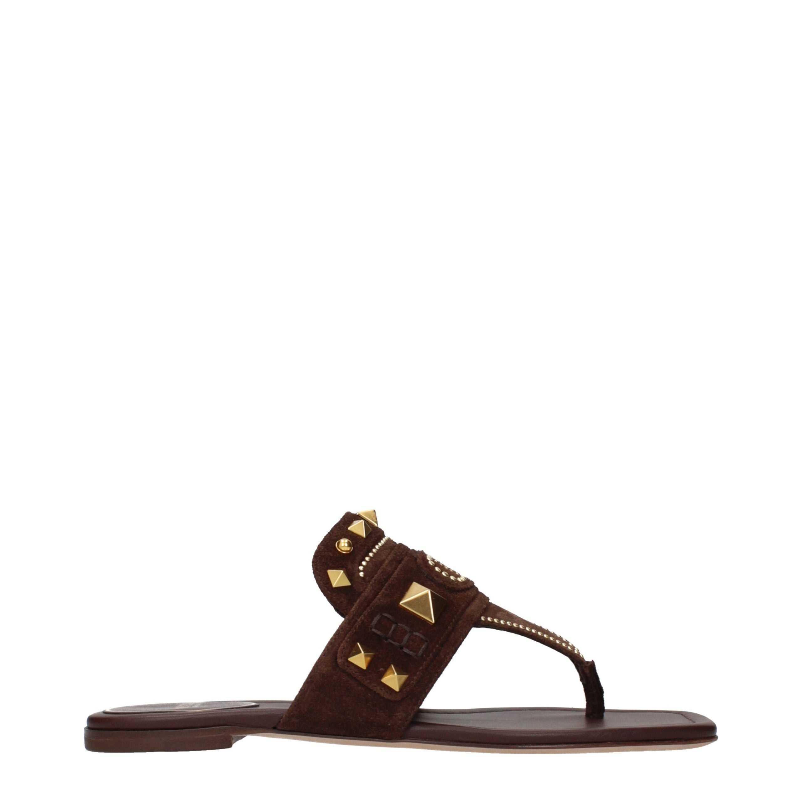 Step into the realm of luxury with Valentino Garavani Brown Leather Flip-Flop Sandals, where exquisite craftsmanship meets timeless elegance for every sophisticated occasion.