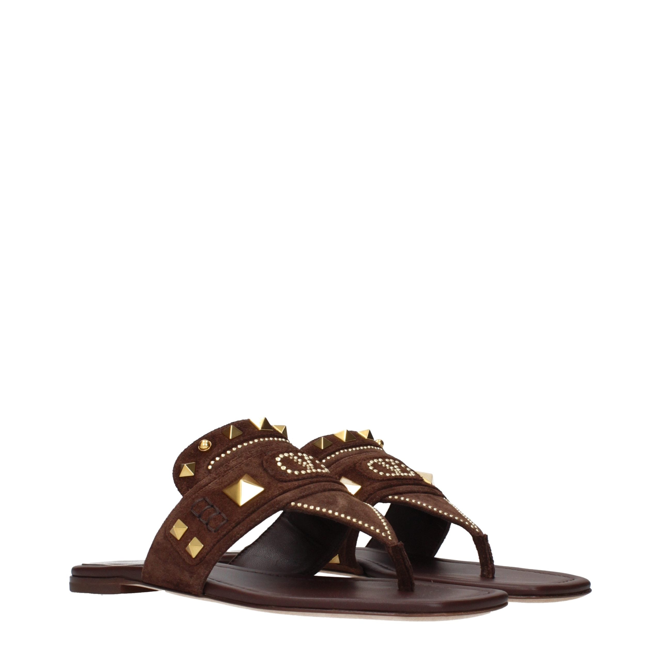 Experience the allure of Valentino Garavani Brown Leather Flip-Flop Sandals, where exquisite craftsmanship meets effortless elegance for a lifestyle of luxury.