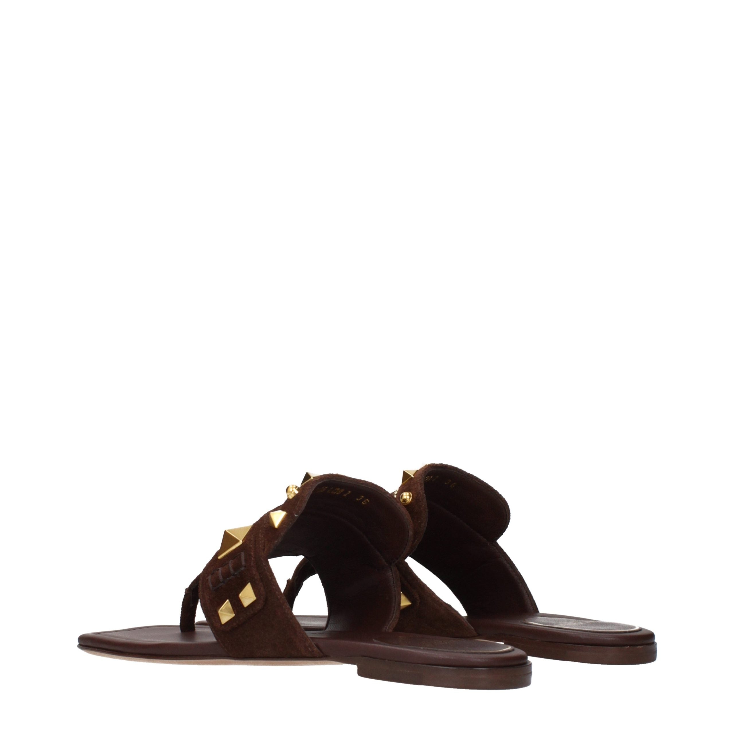 Experience the exquisite allure of Valentino Garavani Brown Leather Flip-Flop Sandals, where luxury craftsmanship meets effortless elegance for the discerning individual.