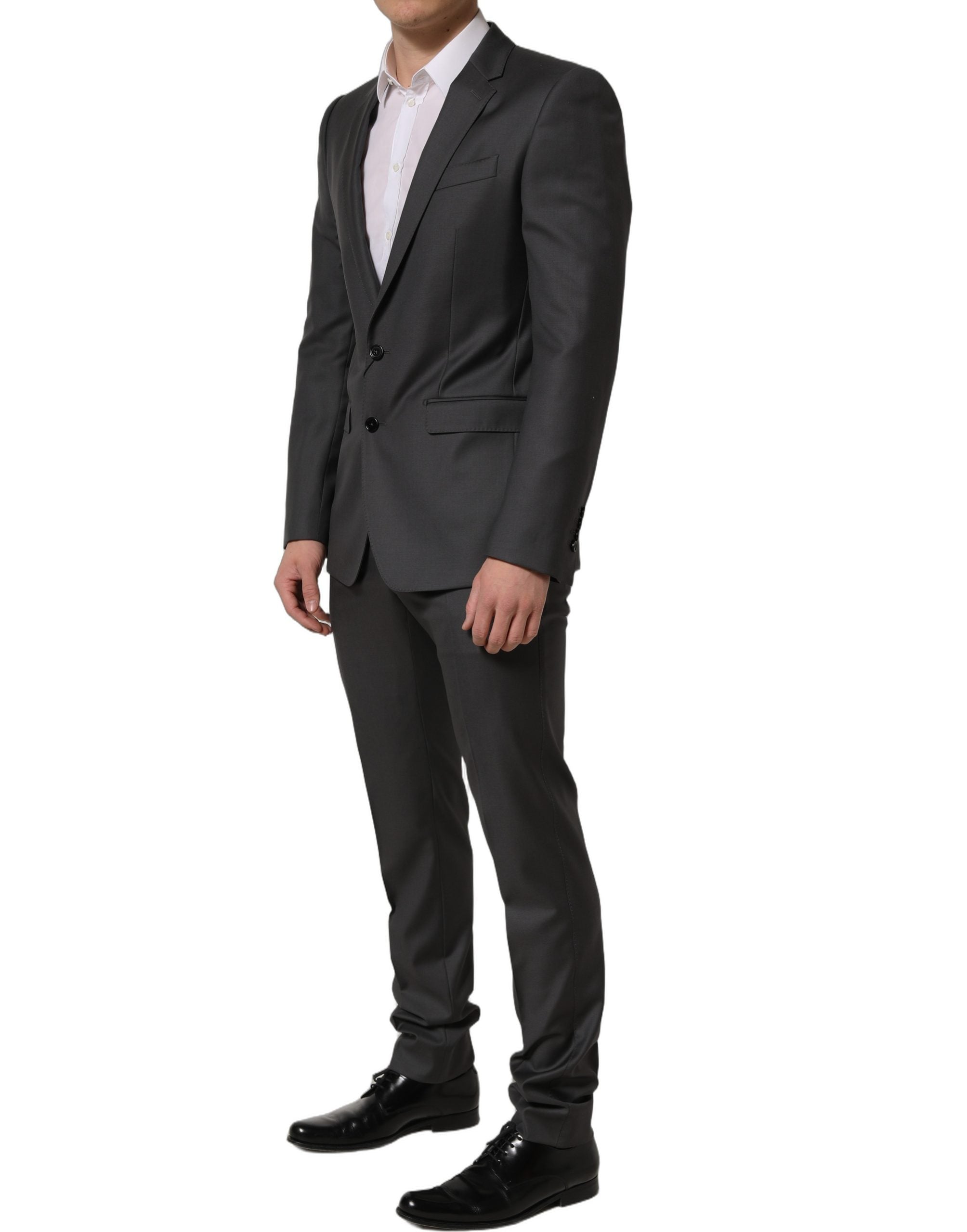 Discover the Dolce & Gabbana Gray MARTINI Slim Fit Formal Suit, a masterpiece of 100% virgin wool, embodying elegance and sophistication for the discerning individual.