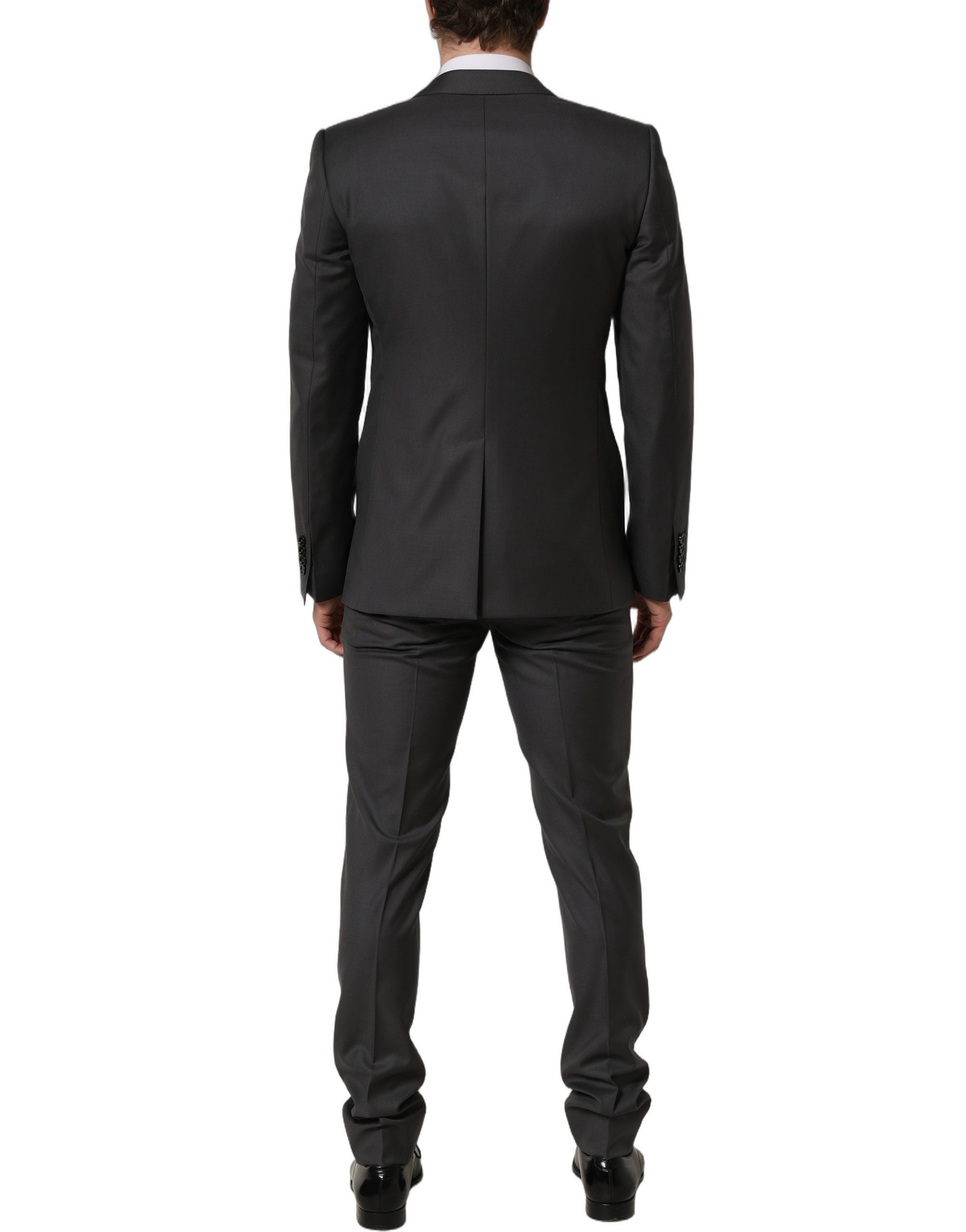 Elevate your style with the Dolce & Gabbana Gray MARTINI Slim Fit Suit, crafted from luxurious virgin wool for a sophisticated, timeless allure that commands attention.