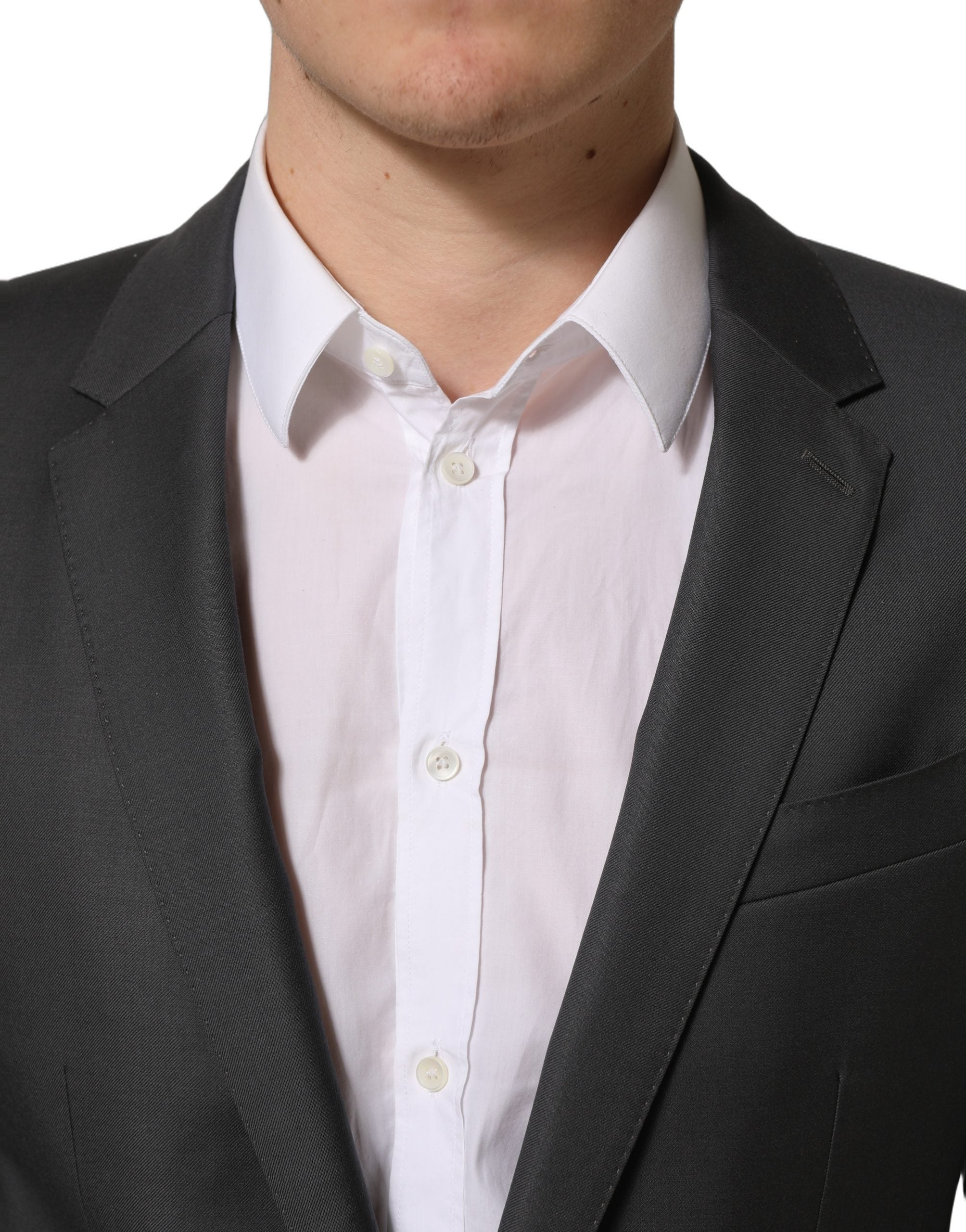 Discover the Dolce & Gabbana Gray MARTINI Slim Fit Suit, a masterpiece in virgin wool that embodies sophistication and timeless elegance for the discerning individual.