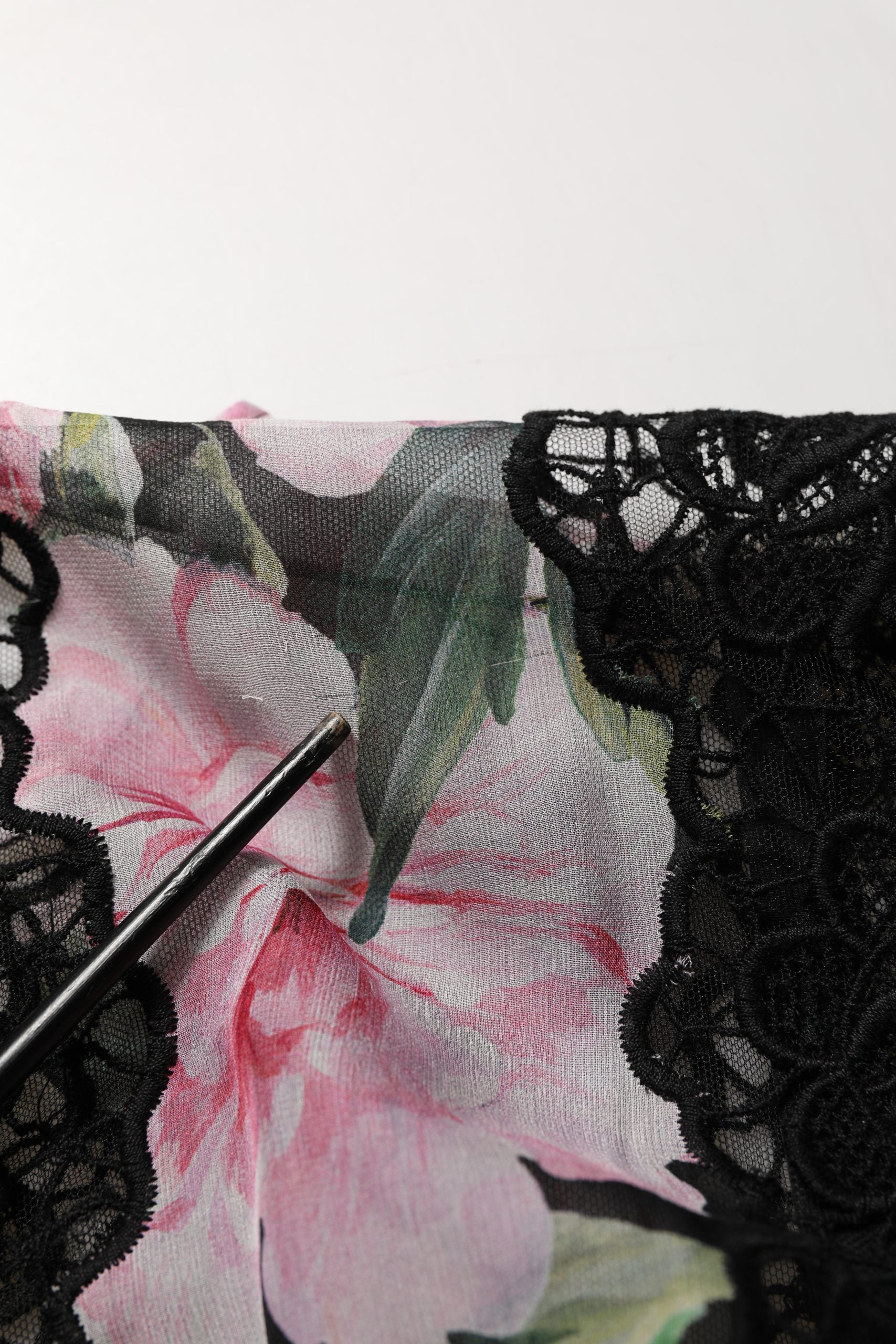 Experience the exquisite allure of the Dolce & Gabbana Black Floral Print Cotton Lace Maxi Dress, a testament to Italian craftsmanship that elevates any occasion.