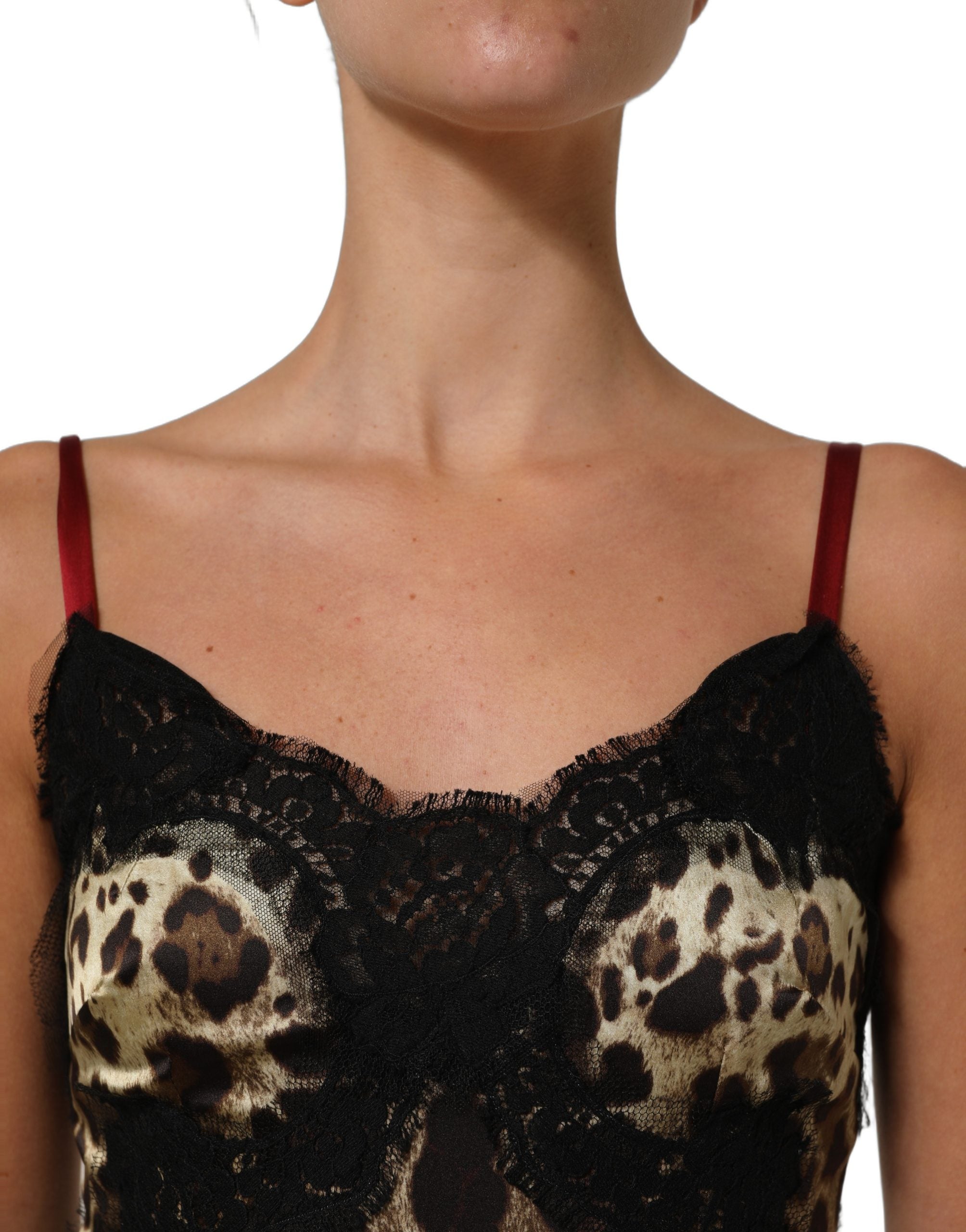 Experience the allure of Dolce & Gabbana's Multicolor Floral Leopard Silk Lace Trim Mini Dress, a masterpiece of Italian craftsmanship that embodies timeless elegance and sophistication.