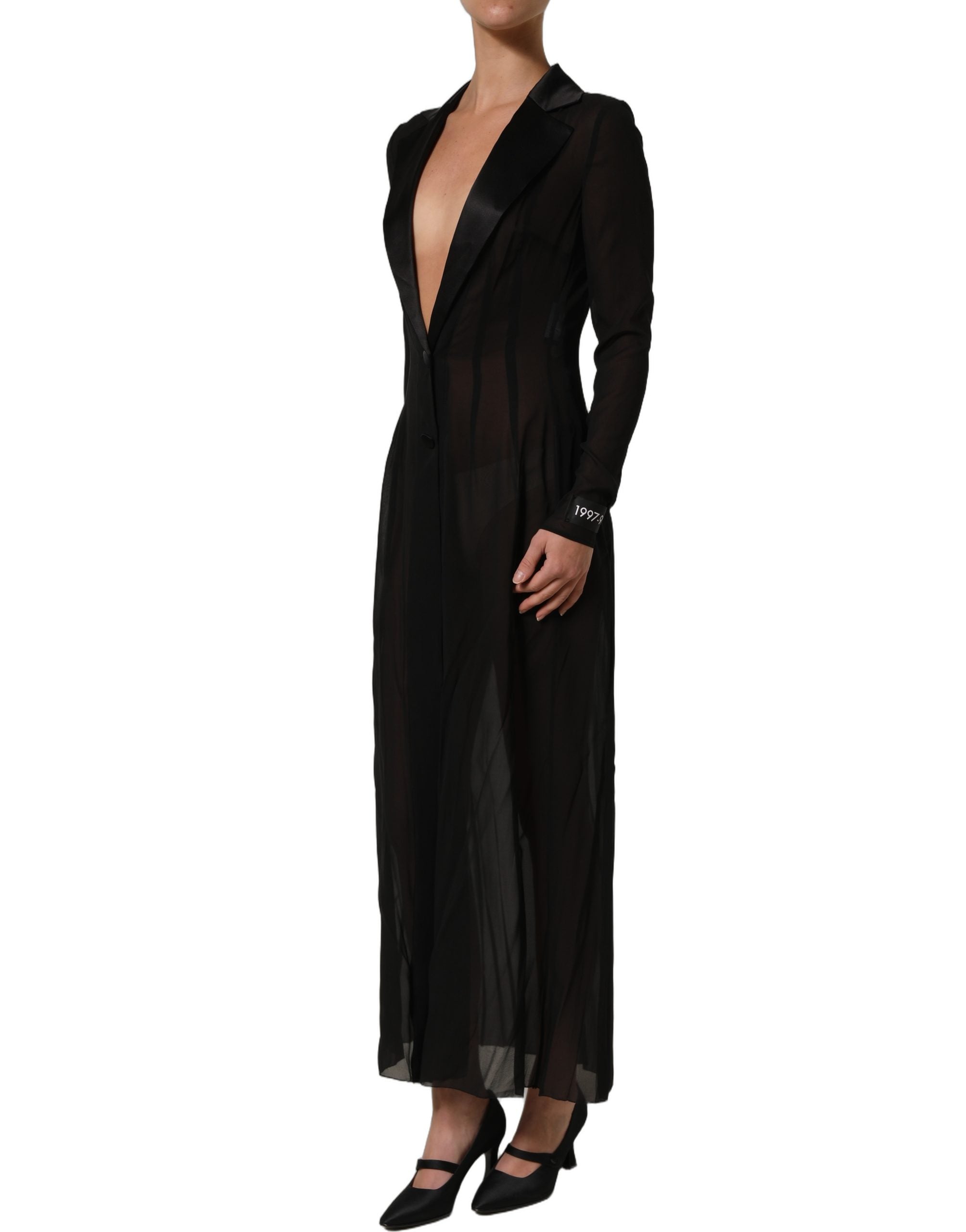 Experience the allure of the Dolce & Gabbana Black Silk Sheer Chiffon Long Maxi Dress, a masterpiece of Italian craftsmanship that redefines luxury and elegance.