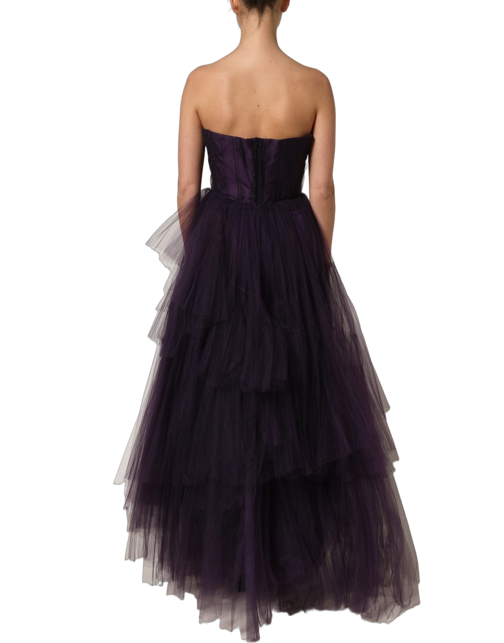 Indulge in the exquisite allure of the Dolce & Gabbana Purple Tiered Tulle Silk Long Gown, a masterpiece of Italian craftsmanship that redefines elegance and sophistication.
