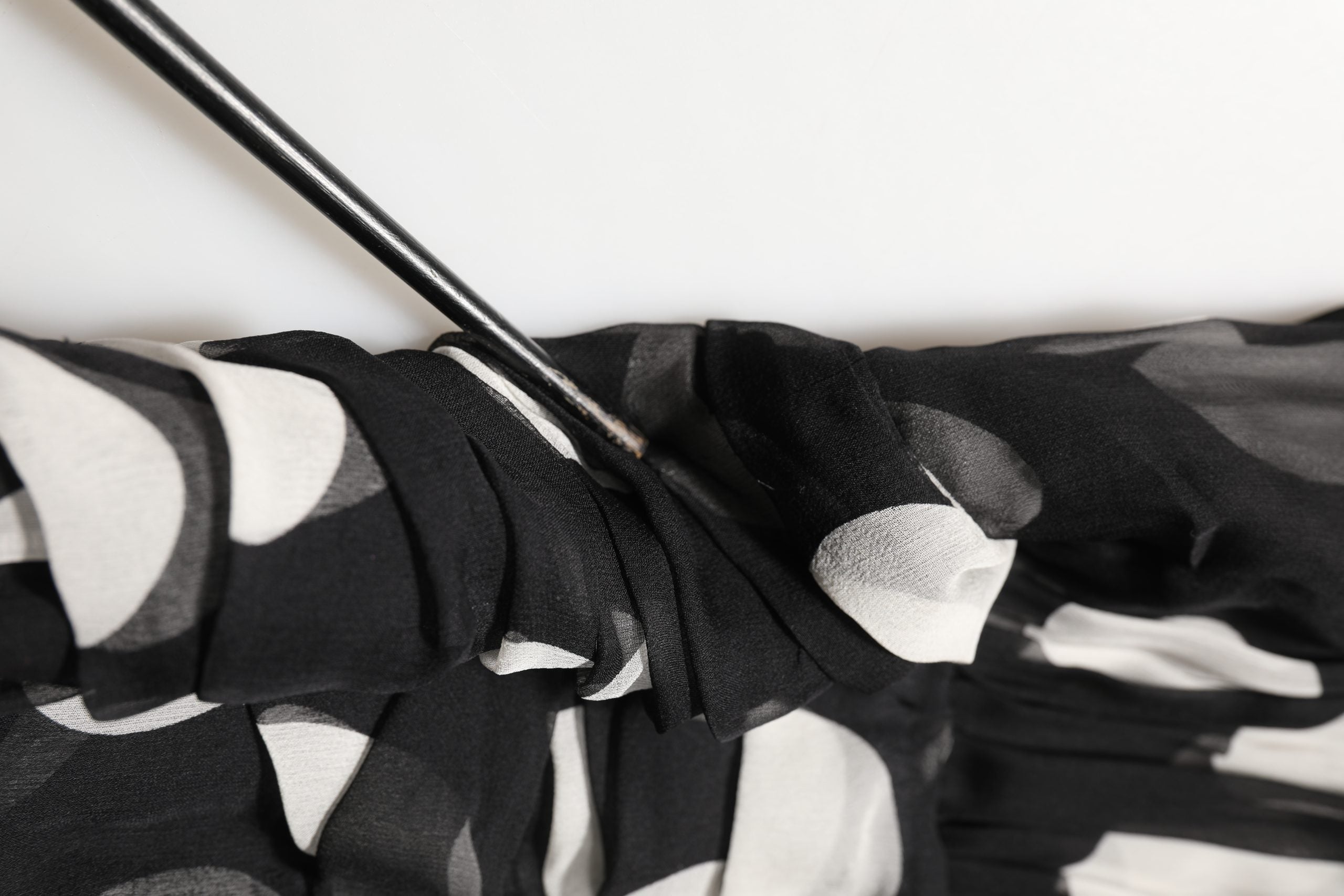Indulge in the exquisite allure of the Dolce & Gabbana Black White Polka Dot Pleated Maxi Dress, a silk masterpiece that embodies timeless elegance and Italian craftsmanship.