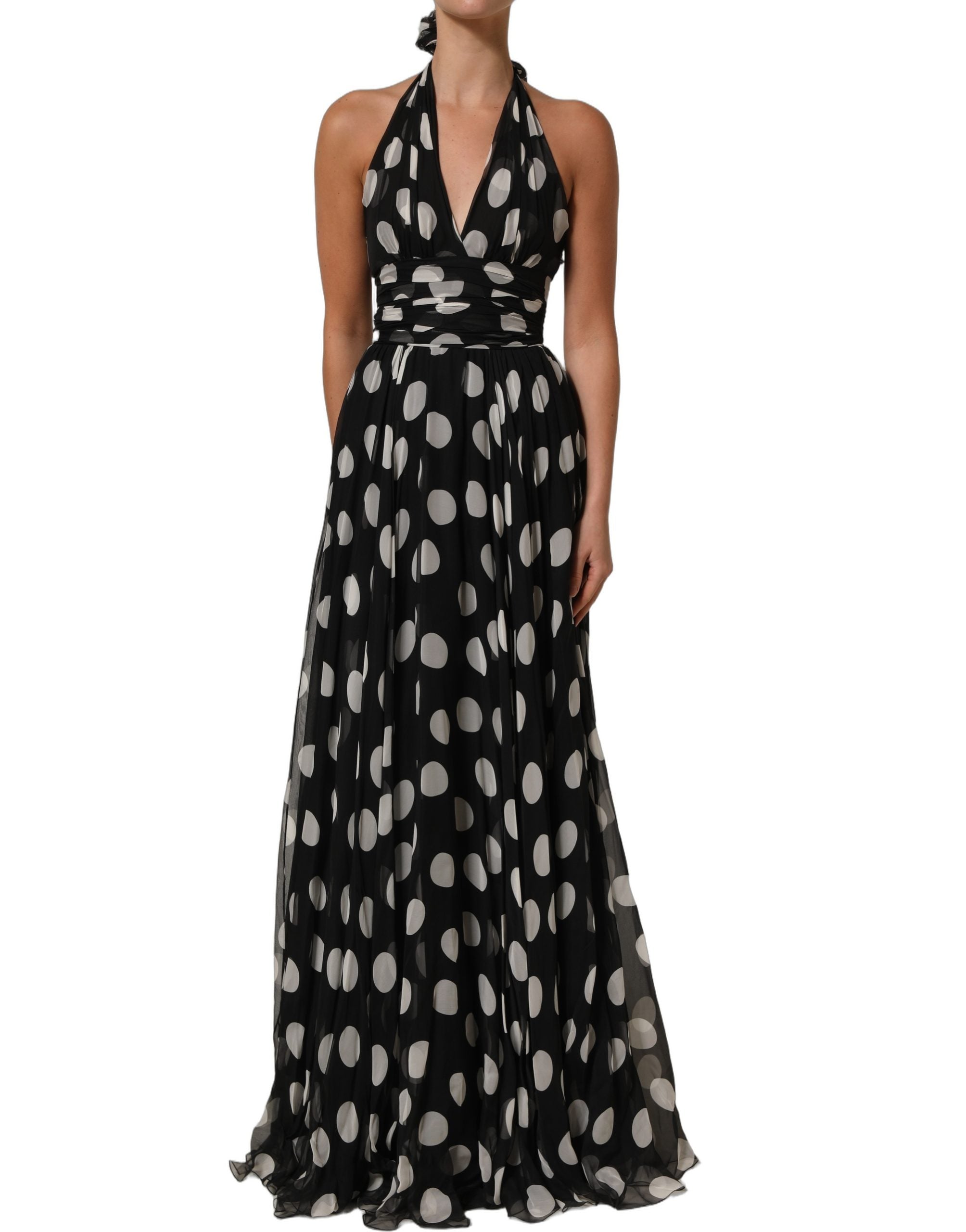 Indulge in the exquisite allure of Dolce & Gabbana's Black White Polka Dot Pleated Maxi Dress, a silk masterpiece that embodies timeless elegance and Italian craftsmanship.