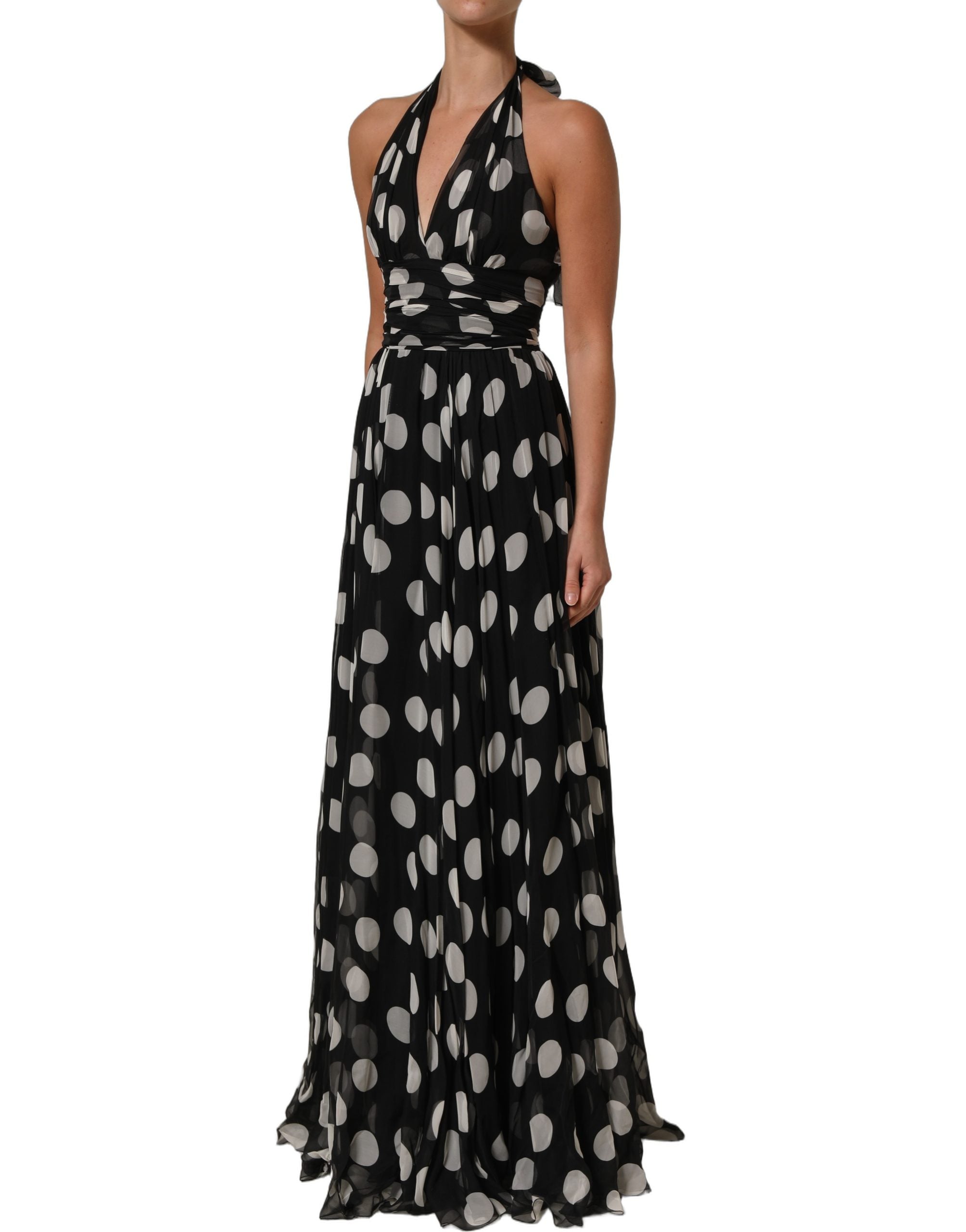 Indulge in the exquisite Dolce & Gabbana Black White Polka Dot Pleated Maxi Dress, a timeless silk masterpiece that embodies refined luxury and Italian craftsmanship.