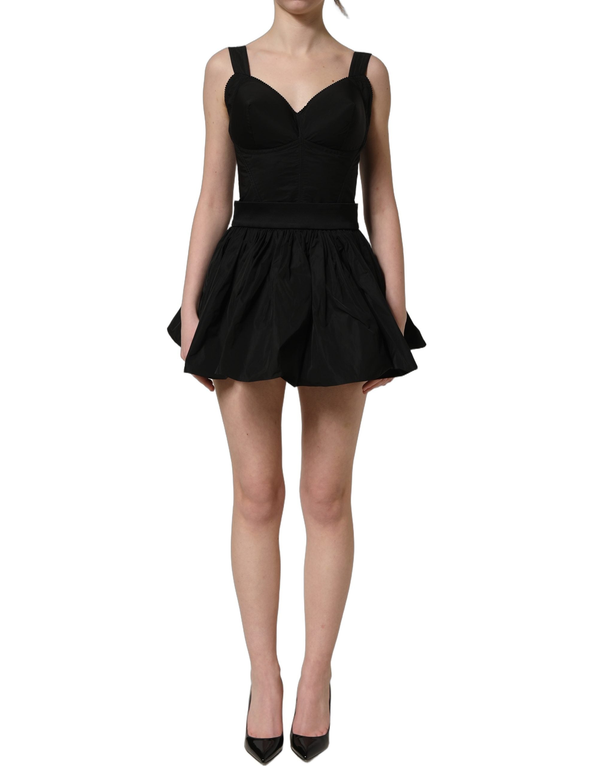 Indulge in the exquisite Dolce & Gabbana Black Nylon A-Line Mini Dress, a masterpiece of Italian craftsmanship, perfect for unforgettable evenings and chic affairs.