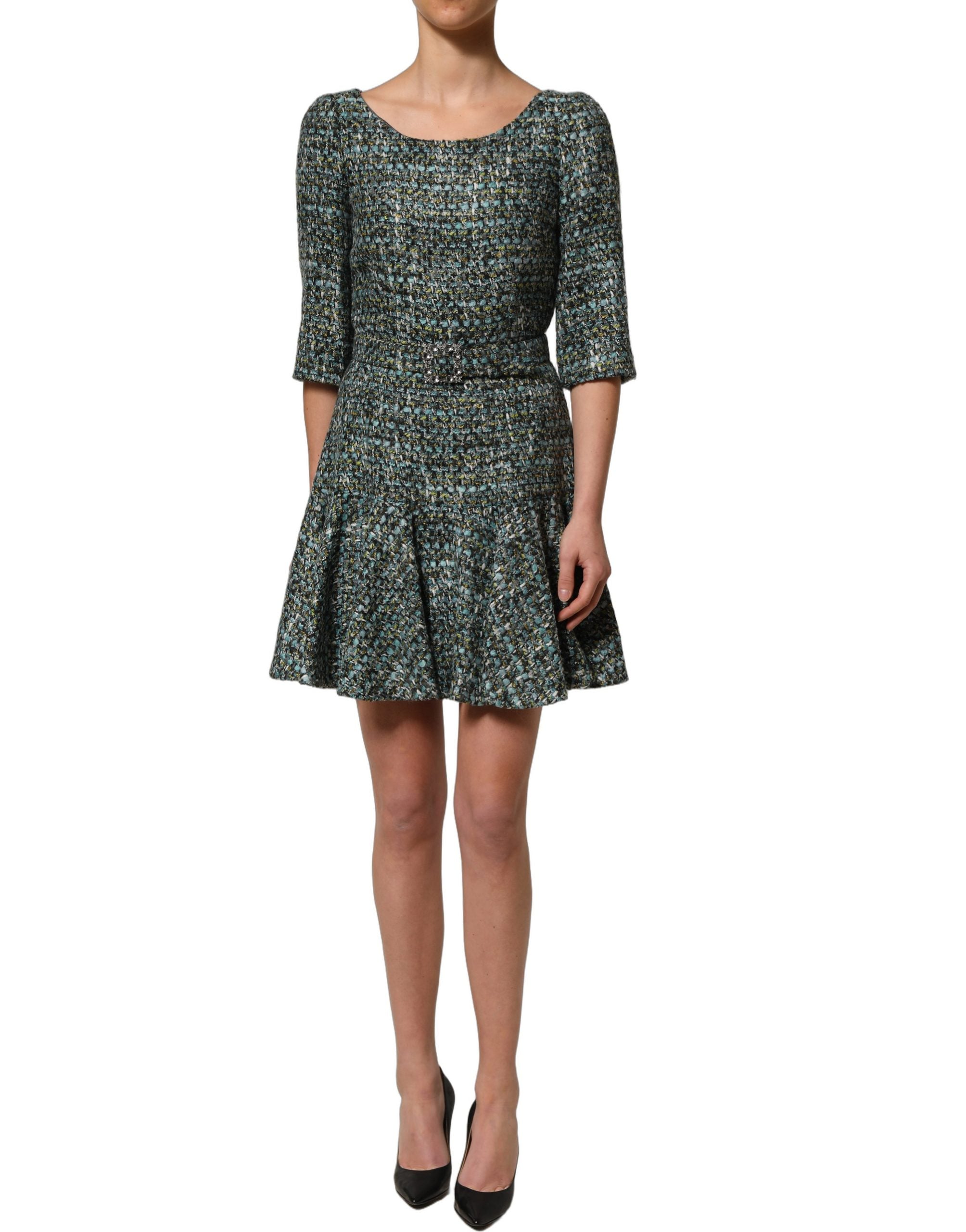 Indulge in the exquisite Dolce & Gabbana Multicolor Tweed Belted Babydoll Mini Dress, a masterpiece of Italian craftsmanship that embodies timeless elegance and allure.