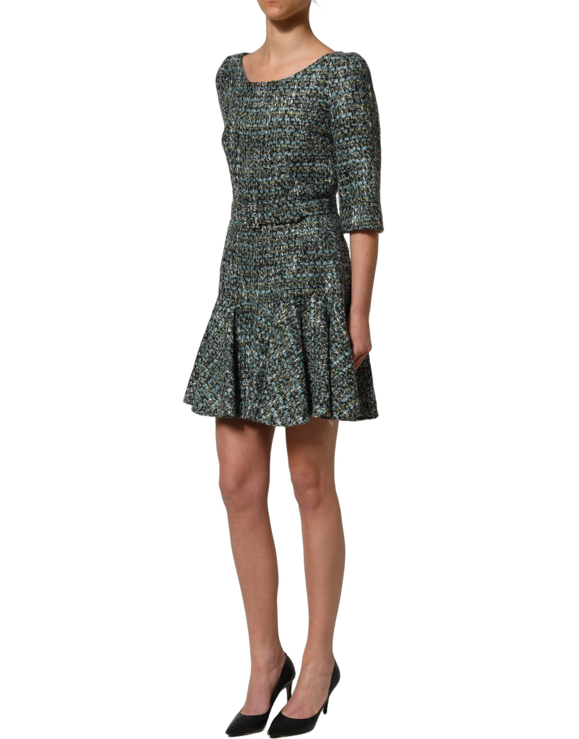 Elevate your elegance with the Dolce & Gabbana Multicolor Tweed Belted Babydoll Mini Dress, a masterpiece of Italian craftsmanship that embodies timeless allure and sophistication.