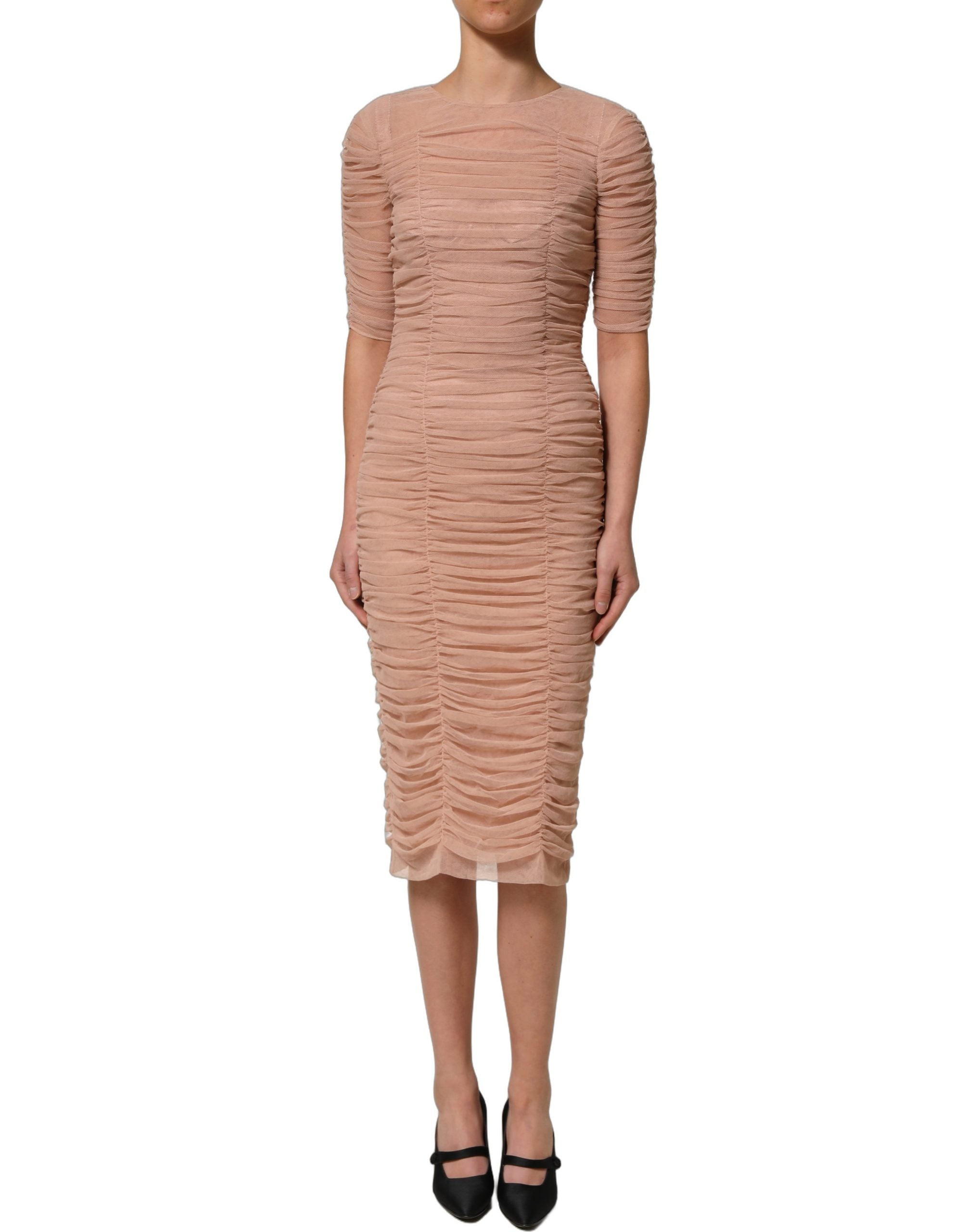 Discover the exquisite Dolce & Gabbana Beige Cotton Mesh Ruched Sheath Midi Dress, a testament to Italian craftsmanship, perfect for elevating your sophisticated allure.