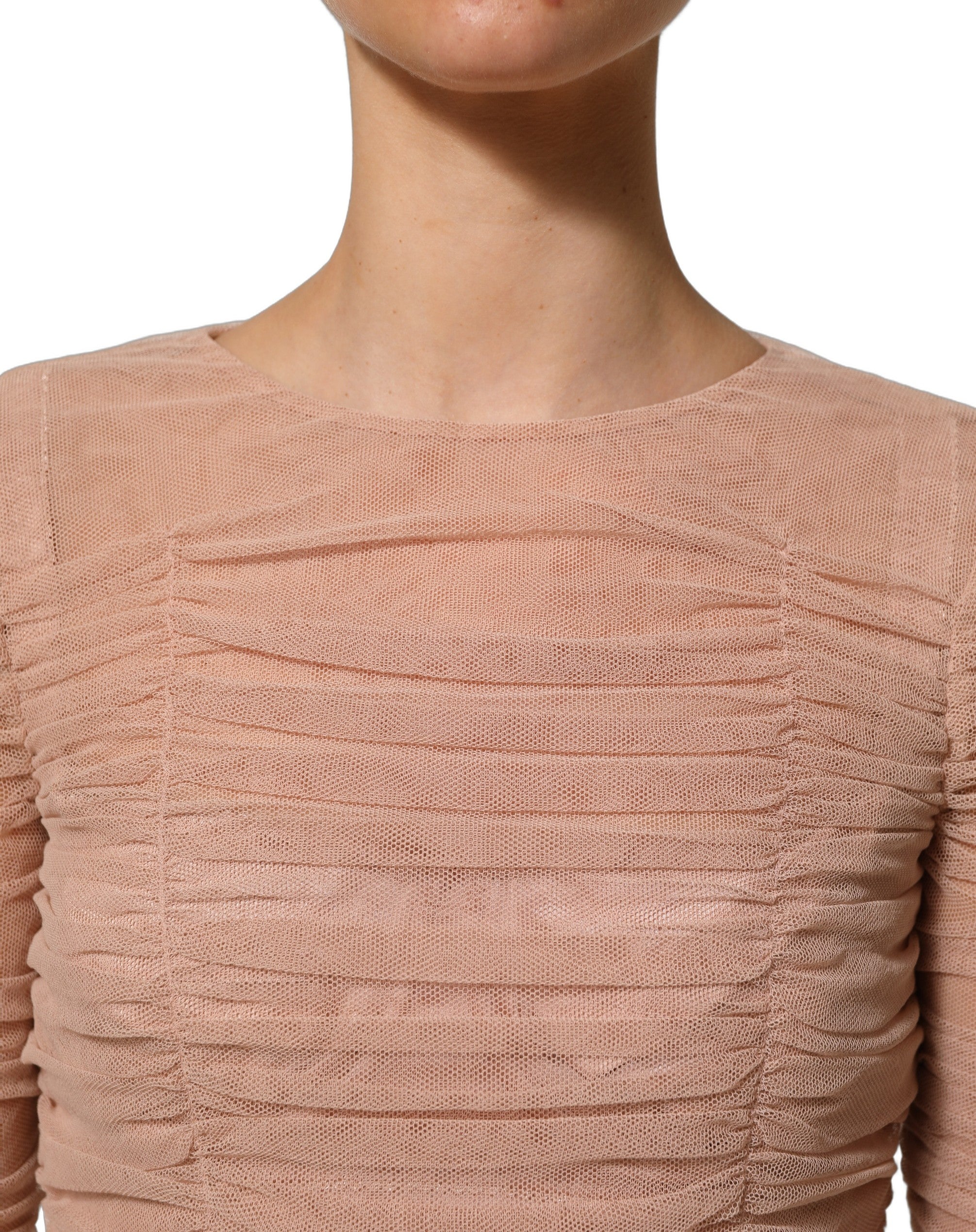 Experience the exquisite allure of the Dolce & Gabbana Beige Cotton Mesh Ruched Sheath Midi Dress, a masterpiece of Italian craftsmanship that embodies timeless elegance and sophistication.