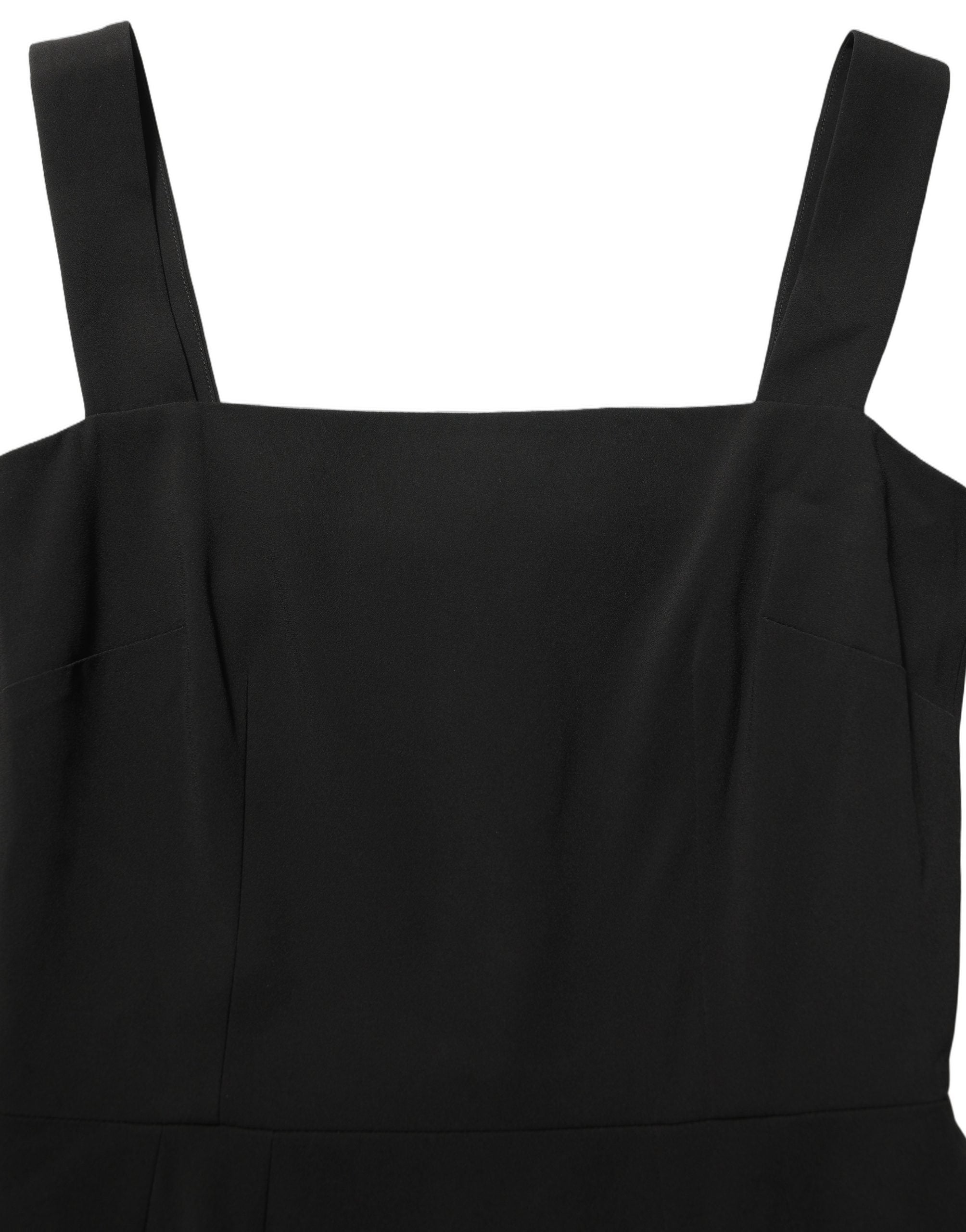 Experience the allure of the Dolce & Gabbana Black Viscose Stretch Sheath Midi Dress, a masterpiece of Italian craftsmanship that embodies timeless elegance and sophistication.