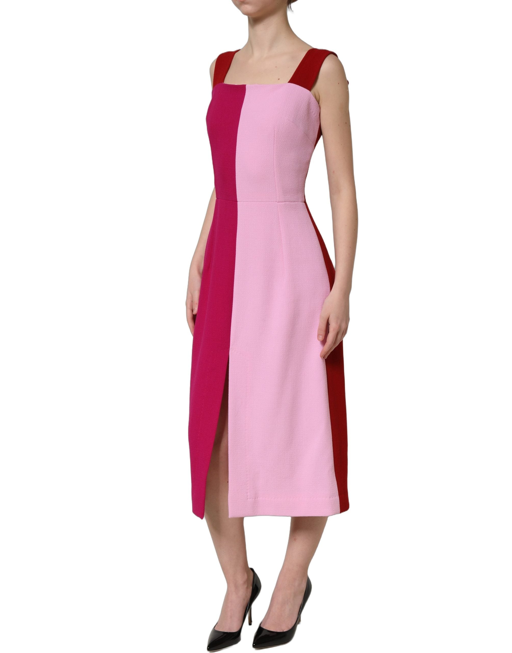 Experience the allure of the Dolce & Gabbana Two Tone Pink Wool Sleeveless Midi Dress, a masterpiece of Italian craftsmanship that embodies timeless elegance and sophistication.