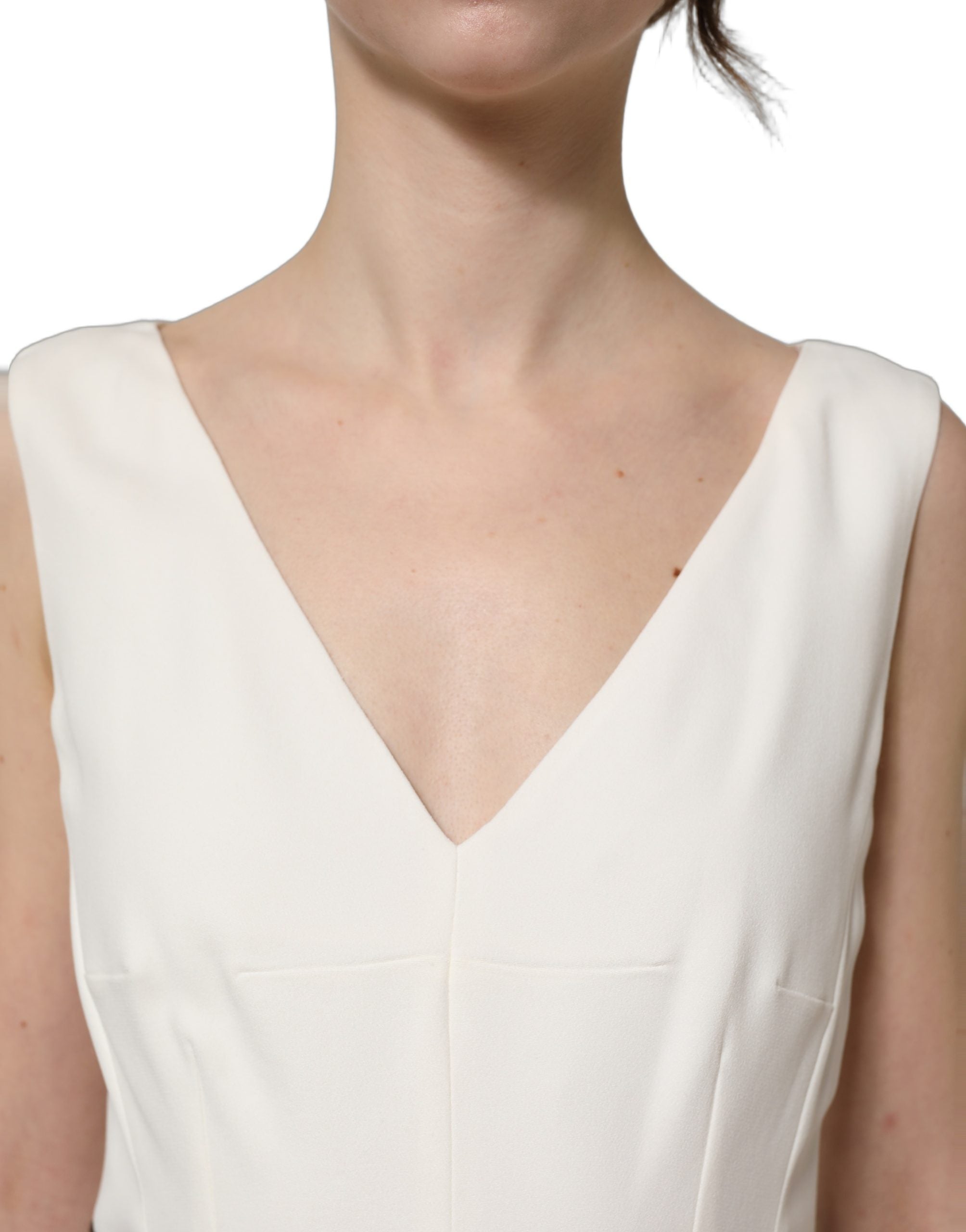 Experience the allure of the Dolce & Gabbana White Leopard Sleeveless Sheath Midi Dress, a masterpiece of luxurious materials and exquisite craftsmanship, perfect for sophisticated occasions.