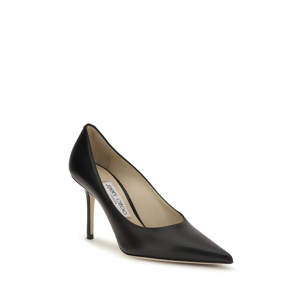 Experience the allure of Jimmy Choo's Love 85 Pumps, handcrafted from premium calf leather, embodying timeless elegance and sophistication for the discerning individual.