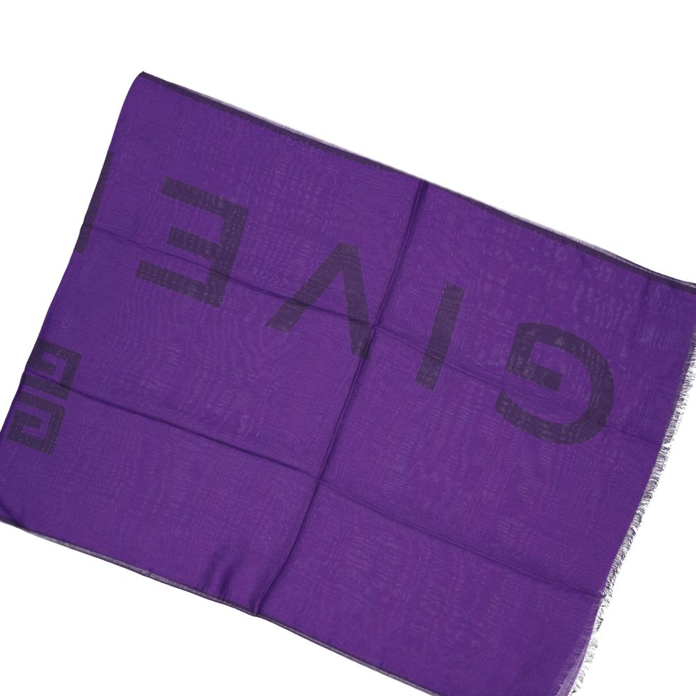 Experience the allure of the Givenchy Purple Cashmere Scarf, a luxurious blend of cashmere and modal, crafted in Italy to elevate your sophisticated style.