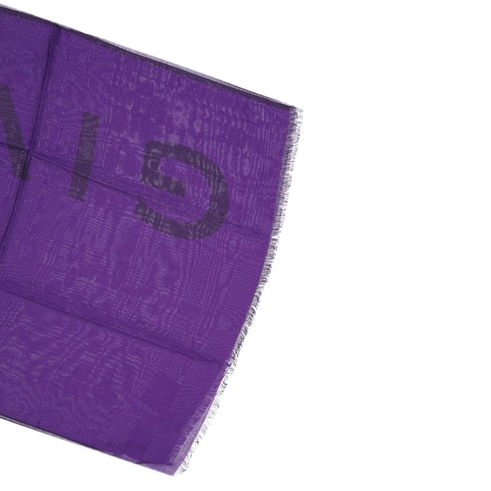 Elevate your style with the Givenchy Purple Cashmere Scarf, a luxurious blend of cashmere and modal, embodying timeless elegance and artisanal craftsmanship.