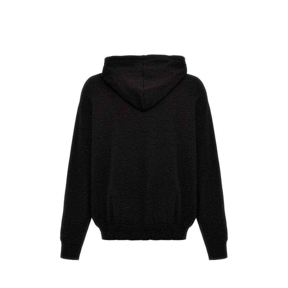 Elevate your style with the Moschino Couture Black Cotton Sweatshirt, a luxurious blend of comfort and sophistication, perfect for the modern connoisseur.
