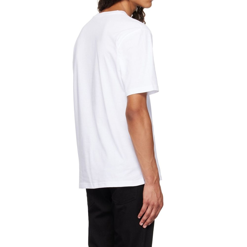 Elevate your wardrobe with the Moschino White Cotton T-Shirt, a masterpiece of luxury and comfort, embodying sophistication for the discerning individual.