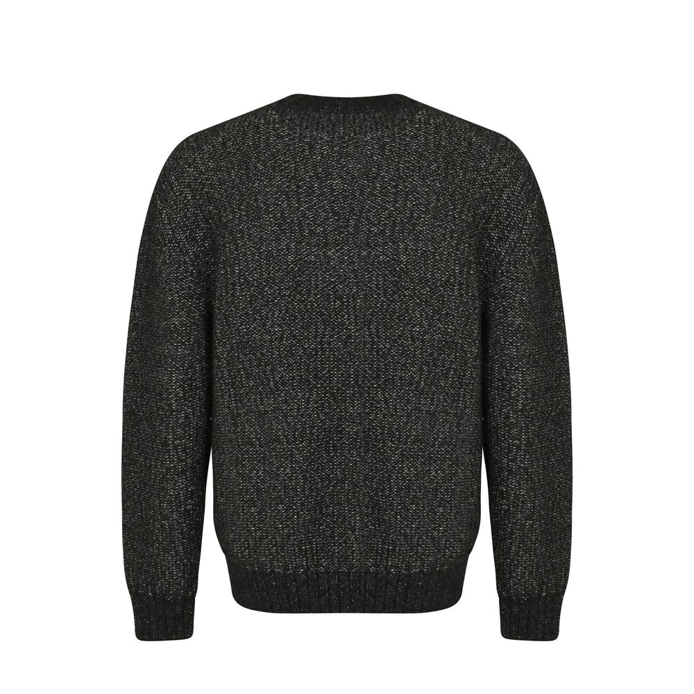 Indulge in the Loro Piana Black Cashmere Sweatshirt, a masterpiece of Italian craftsmanship blending cashmere, cotton, and silk for unparalleled luxury and sophistication.