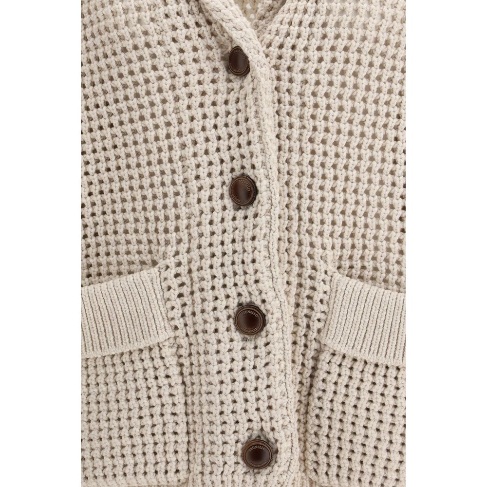 Elevate your wardrobe with the Brunello Cucinelli Beige Cotton Cardigan, a masterpiece of artisanal luxury crafted from refined materials for timeless sophistication.