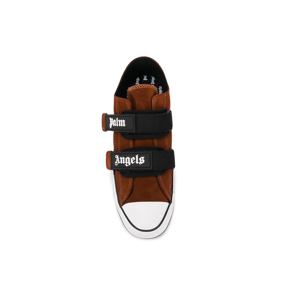 Experience the exquisite Palm Angels Brown Calfskin Low Top Sneakers, where artisanal luxury meets timeless design, crafted for the discerning individual.