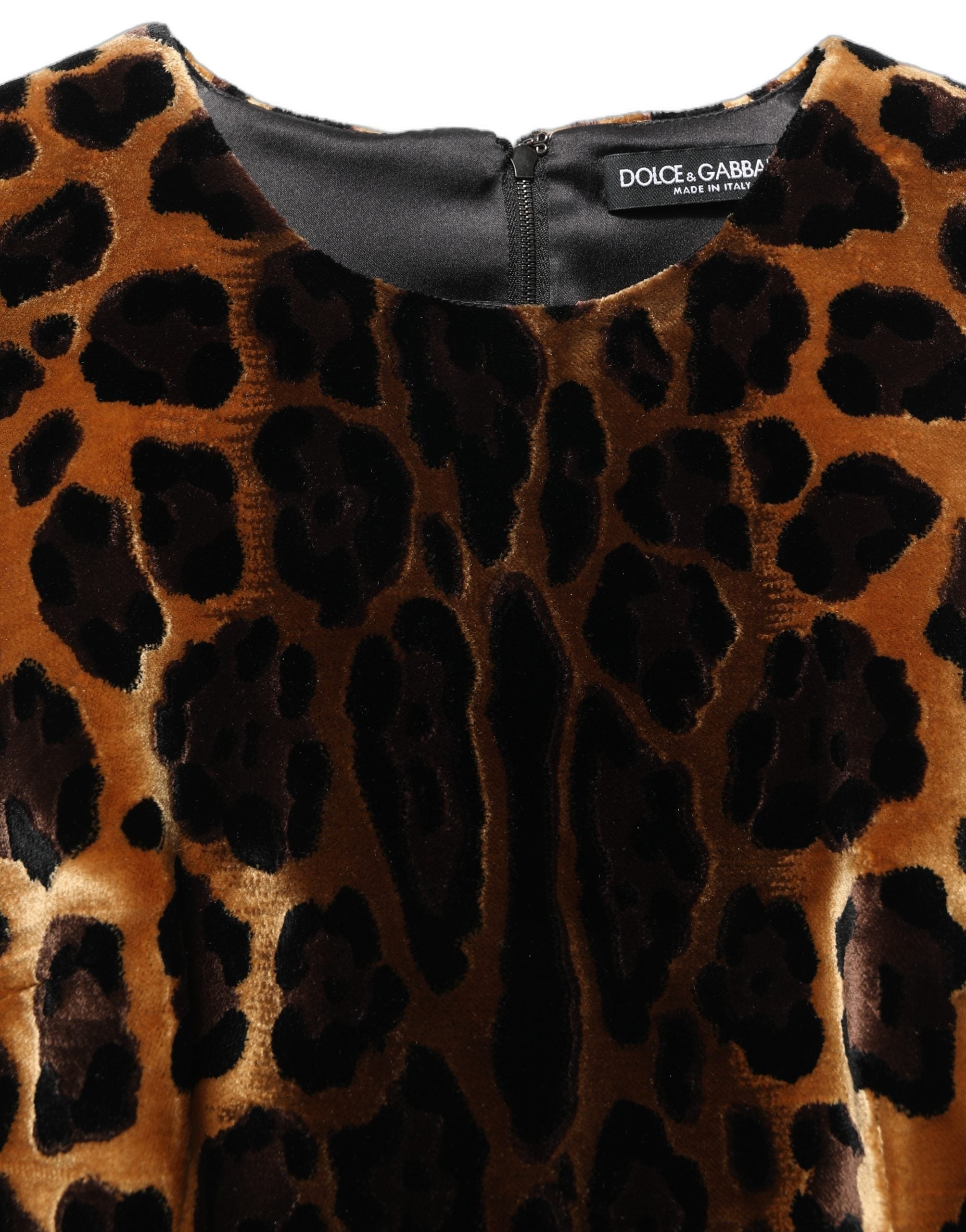 Indulge in the exquisite allure of the Dolce & Gabbana Brown Leopard Sleeveless Sheath Mini Dress, a masterpiece of Italian craftsmanship that redefines elegance.