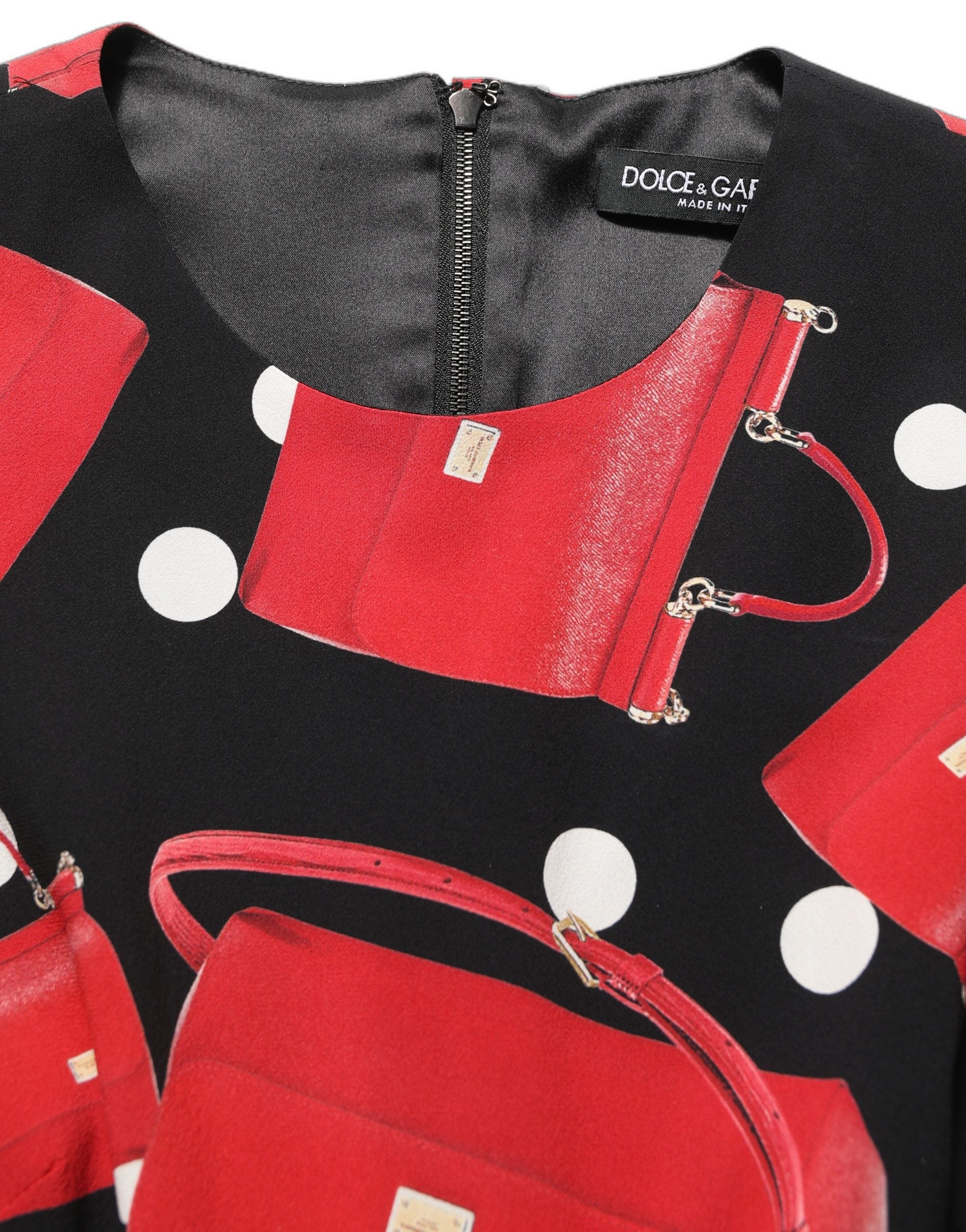 Experience the allure of Dolce & Gabbana's Black Handbag Print Long Sleeve Midi Dress, a luxurious blend of silk and elastane, embodying timeless elegance and exquisite craftsmanship.