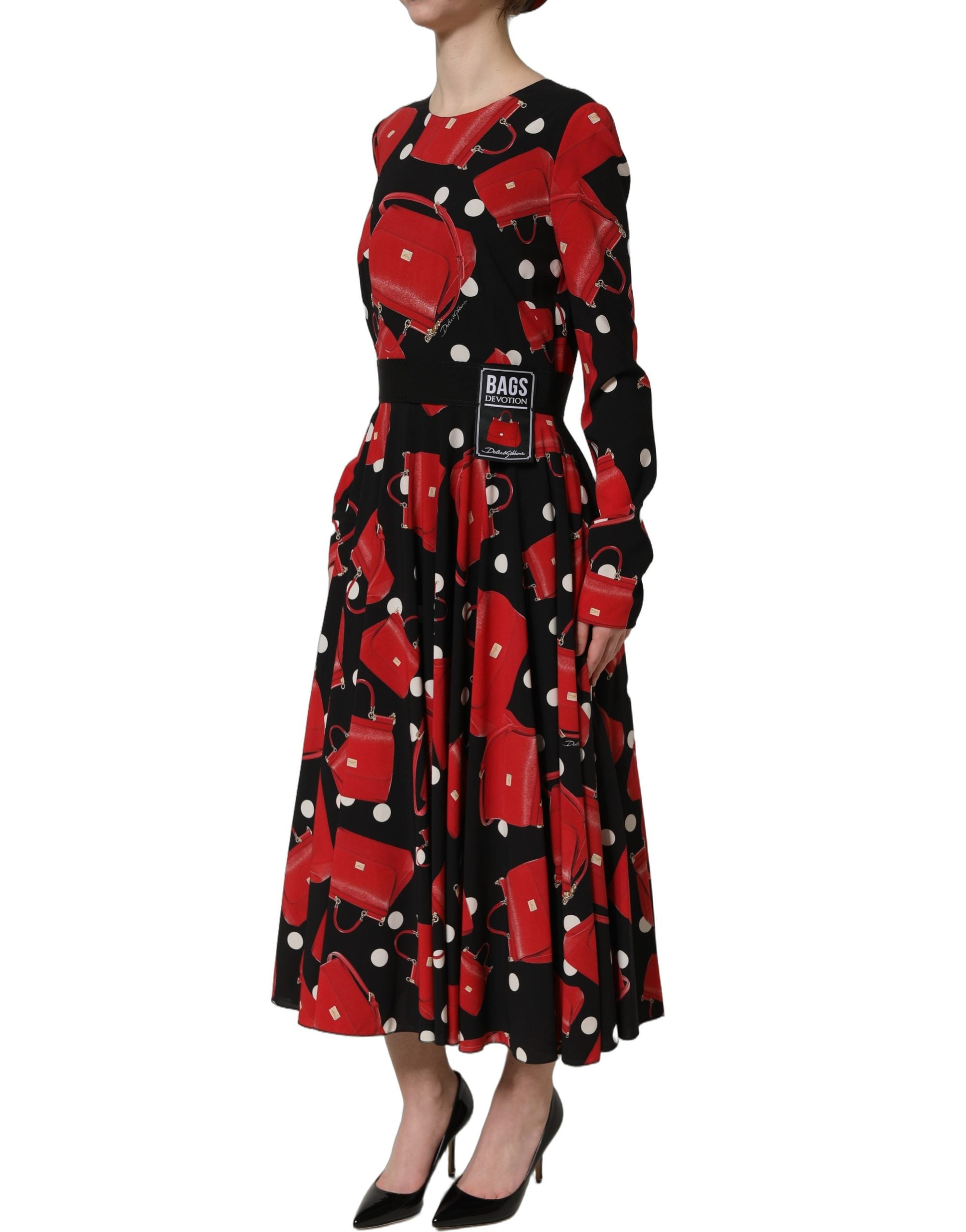 Experience the allure of the Dolce & Gabbana Black Handbag Print Long Sleeve Midi Dress, crafted from luxurious silk for an elegant silhouette that captivates.