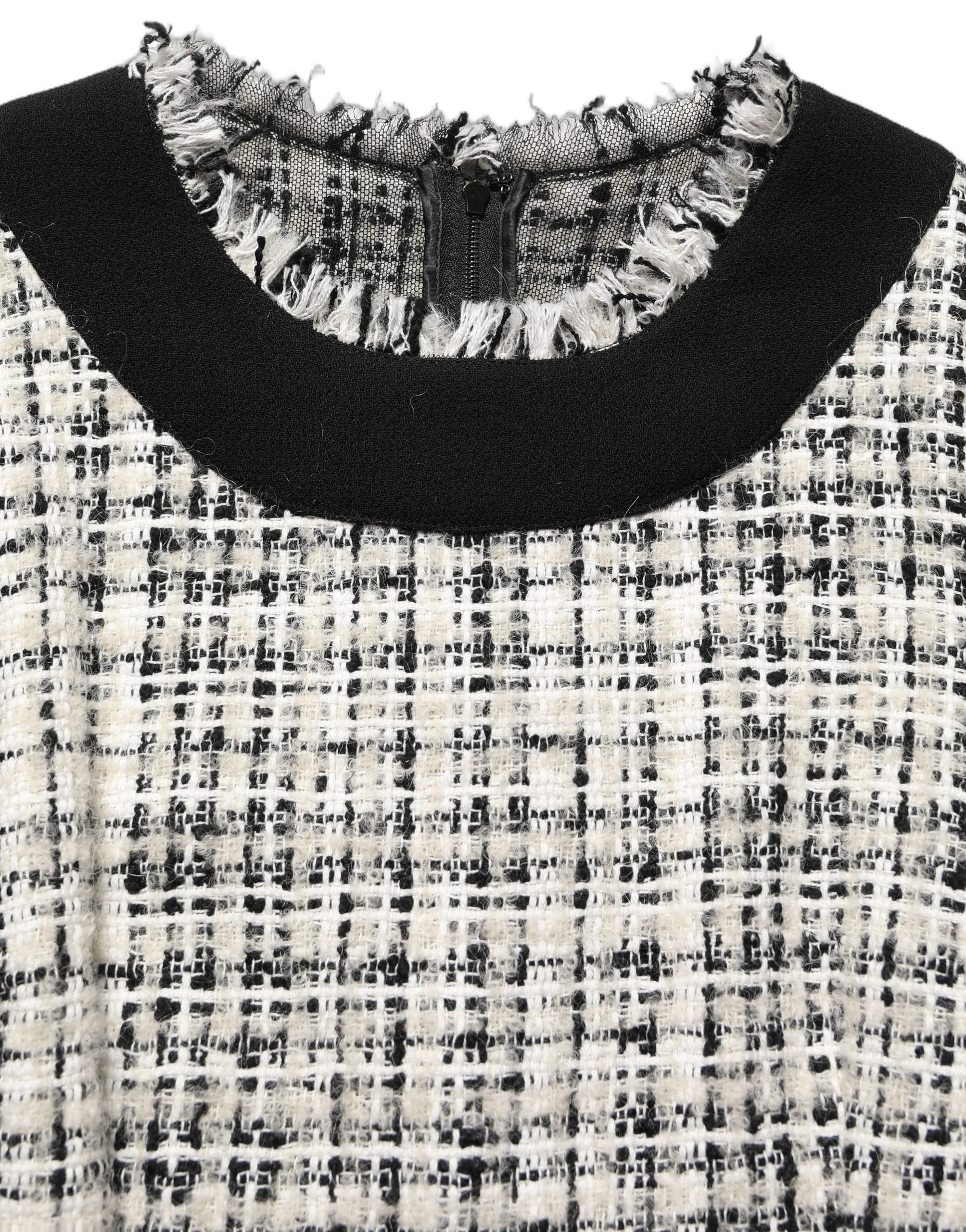 Elevate your wardrobe with the Dolce & Gabbana Multicolor Bouclé Tweed Midi Dress, a masterpiece of Italian craftsmanship that embodies timeless elegance and luxurious allure.