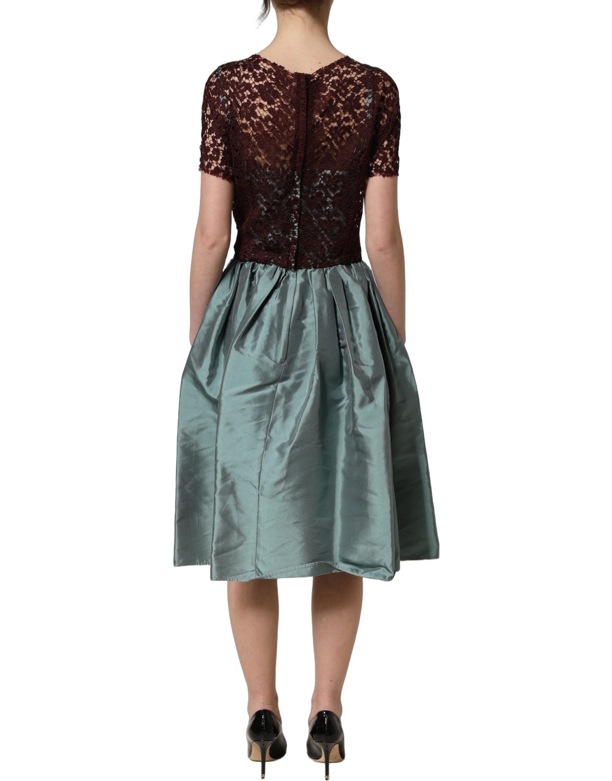 Discover the exquisite Dolce & Gabbana Multicolor Floral Lace Taffeta Pleated Midi Dress, a masterpiece of Italian craftsmanship that embodies timeless elegance and allure.