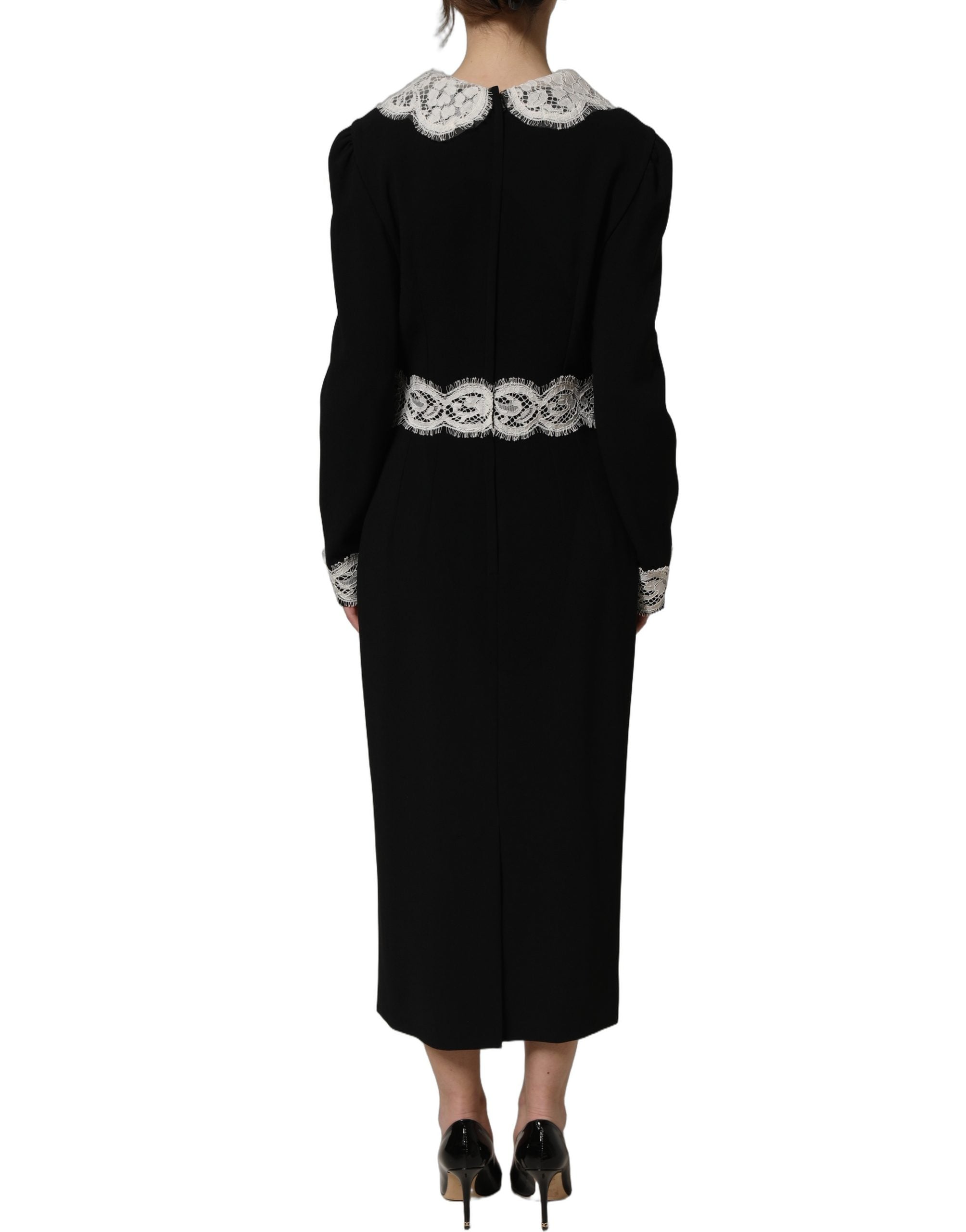 Indulge in the exquisite allure of the Dolce & Gabbana Black Lace Detailing Long Sleeves Midi Dress, a masterpiece of Italian craftsmanship that embodies timeless elegance and sophistication.