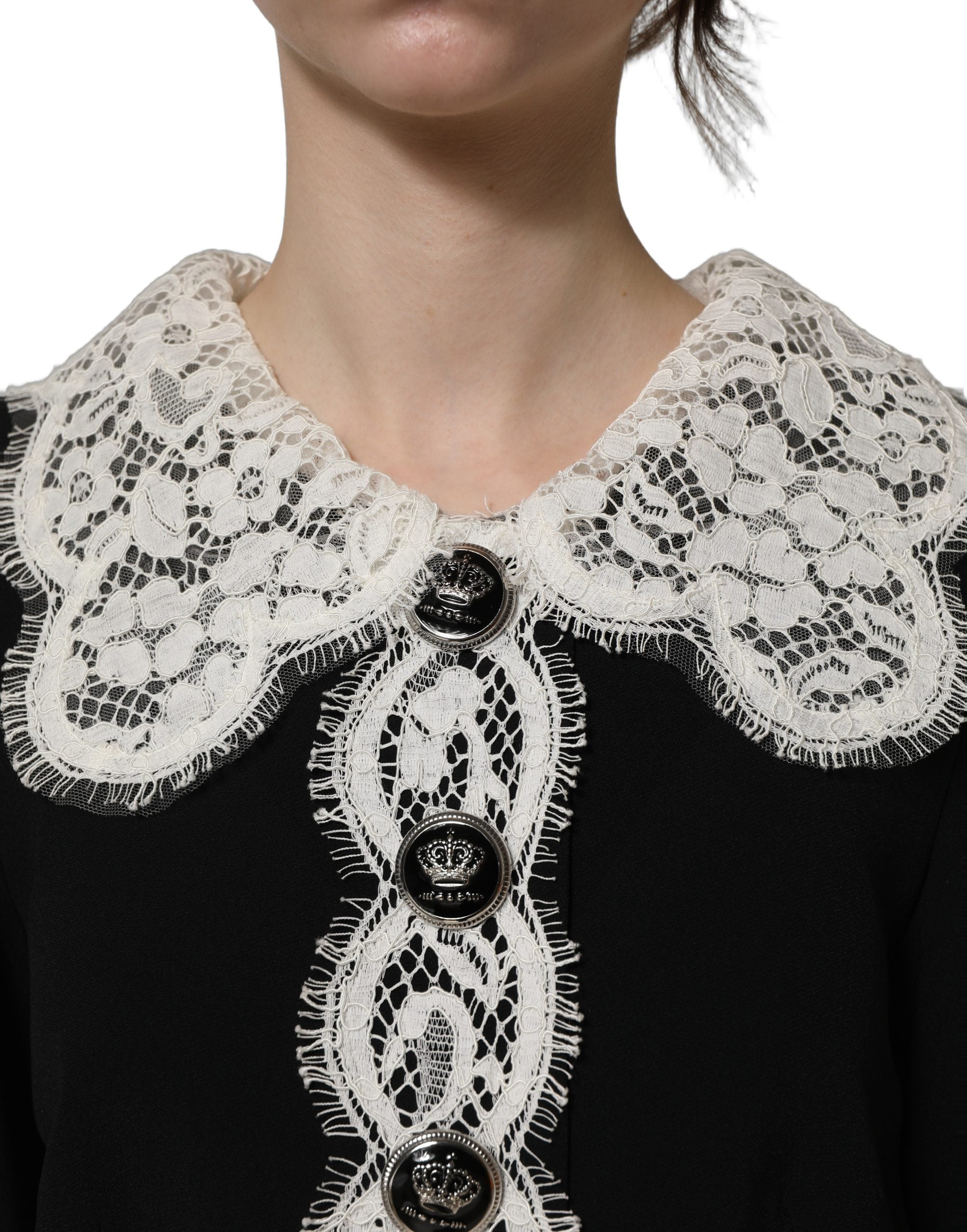 Experience the allure of the Dolce & Gabbana Black Lace Detailing Midi Dress, a masterpiece of Italian craftsmanship that embodies timeless elegance and sophistication.