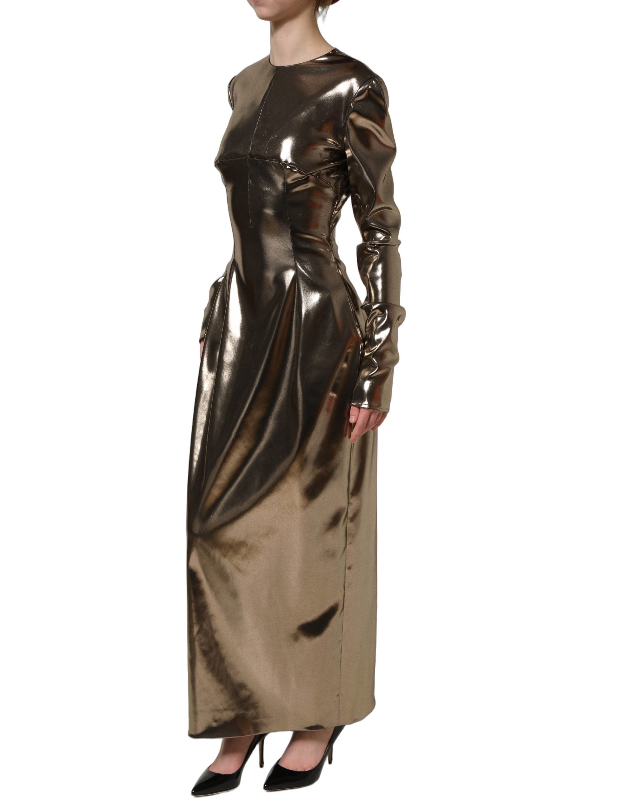 Indulge in the opulence of the Dolce & Gabbana Metallic Gold Maxi Dress, a masterpiece of exquisite craftsmanship and luxurious design, perfect for unforgettable occasions.